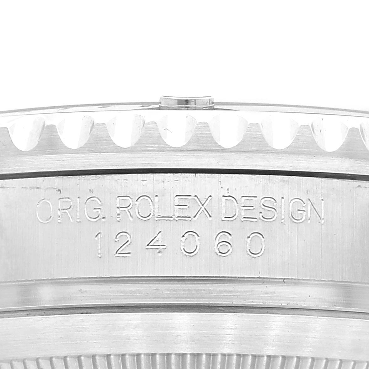 This image shows a close-up view of the engraved side of a Rolex Submariner 124060 Men
s Stainless Steel Black Dial 124060 Men
s Stainless Steel Black Dial watch, highlighting the bezel and reference number 124060.