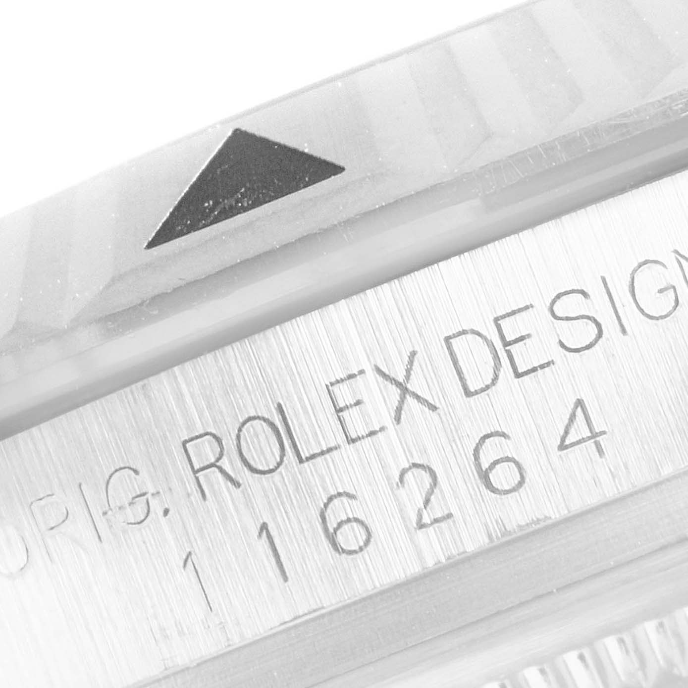 This close-up shows the bezel and part of the casing, including the model and serial number, of the Rolex Turn-o-Graph 116264 Men
s Stainless Steel White Dial 116264 Men
s Stainless Steel White Dial watch.
