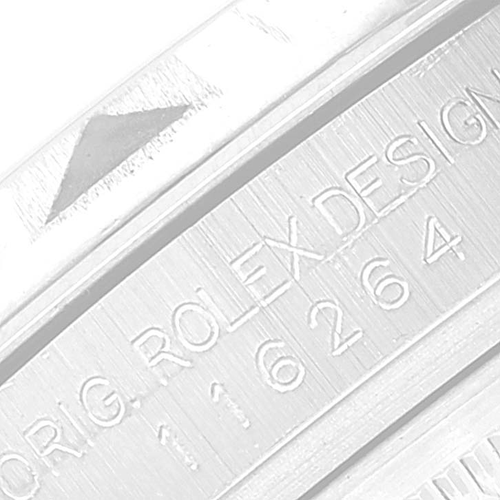 This image shows a partial close-up of the bezel and rehaut with engraved numbers and letters of a Rolex Turn-o-Graph 116264 Men's Stainless Steel White Dial 116264 Men's Stainless Steel White Dial watch.