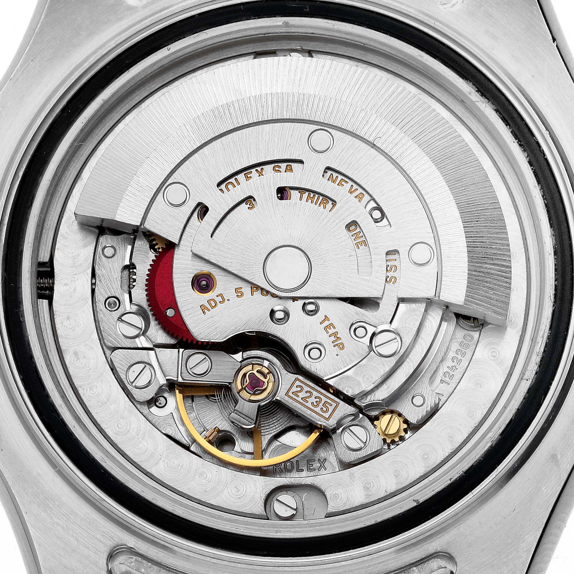 The image shows the detailed movement mechanism of the Rolex Yacht-Master 168623 Men's Steel and Gold (two tone) Mother of Pearl Dial 168623 Men's Steel and Gold (two tone) Mother of Pearl Dial watch from the back.