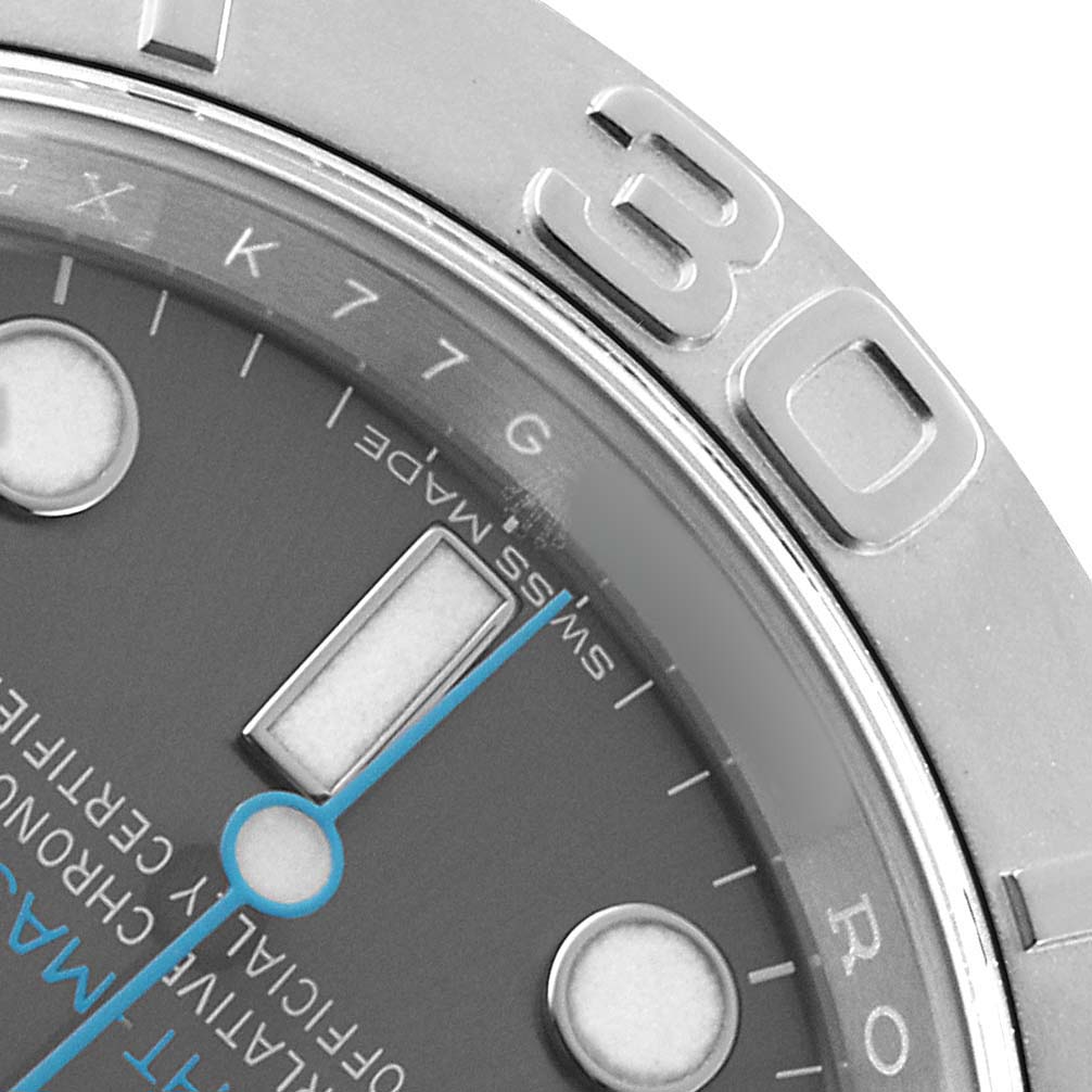 The image shows a close-up of the Rolex Yacht-Master 116622 Men's Stainless Steel Silver Dial watch, highlighting parts of the bezel and dial.