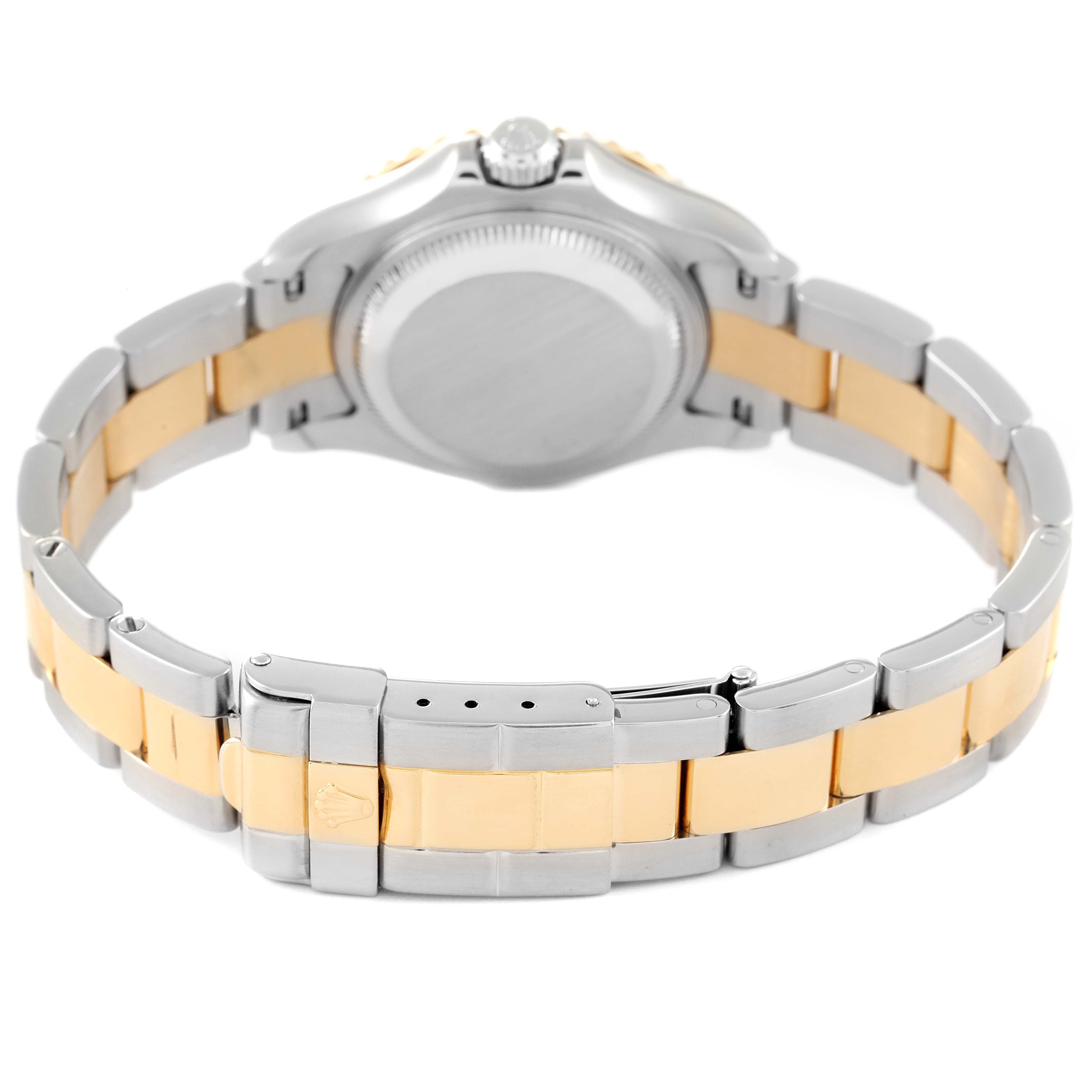 The image shows the Yacht-Master by Rolex from the back, highlighting the case back, bezel, and bracelet clasp.