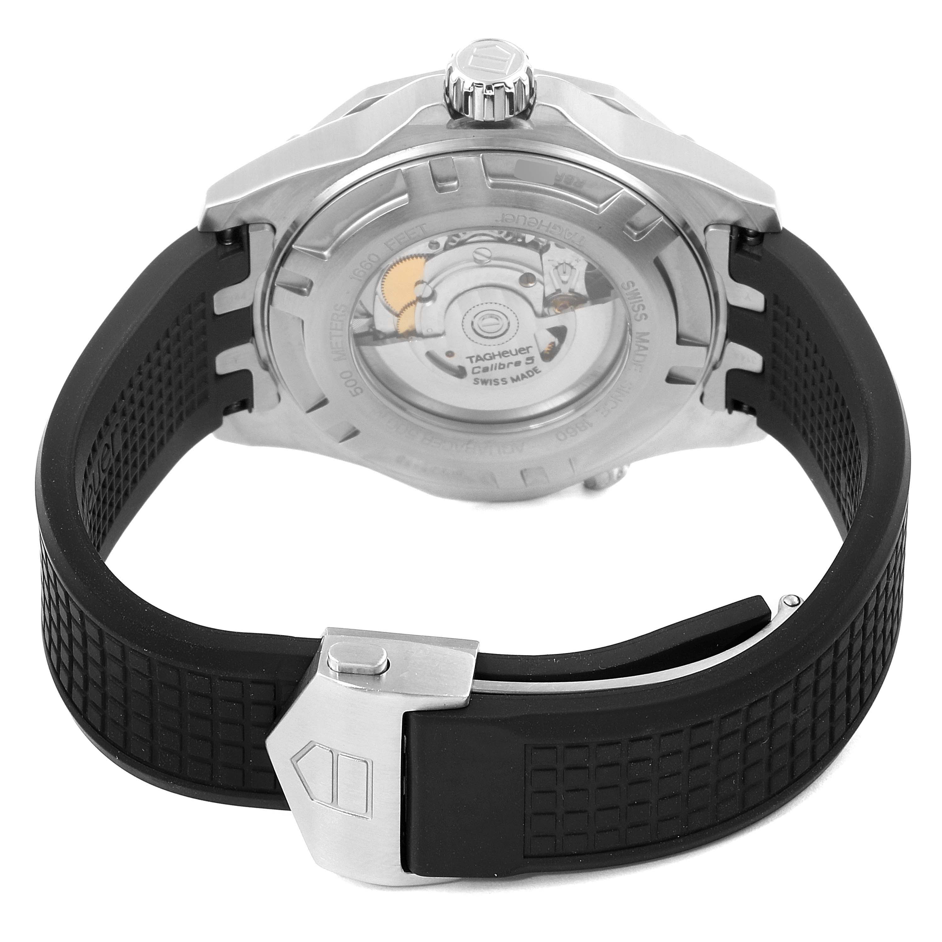 The image shows the back case and rubber strap of the Tag Heuer Aquaracer WAJ2150.FT6015 Men
s Stainless Steel Black Dial WAJ2150.FT6015 Men
s Stainless Steel Black Dial watch, highlighting its movement and clasp.