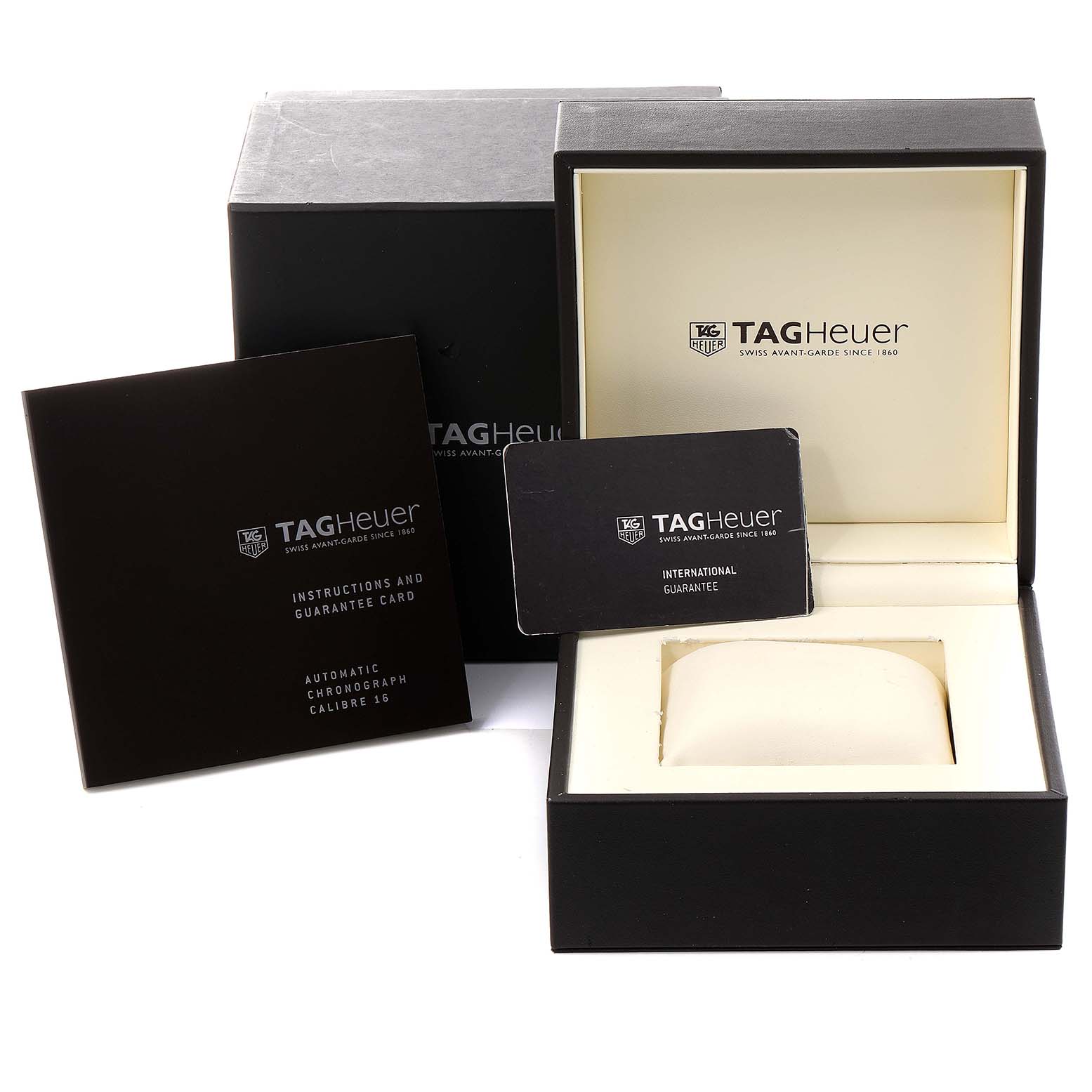 The image shows the packaging and accessories of the Tag Heuer Aquaracer CAK2112.BA0833 Men
s Stainless Steel Blue Dial CAK2112.BA0833 Men
s Stainless Steel Blue Dial, including the box, instruction manual, and guarantee card.