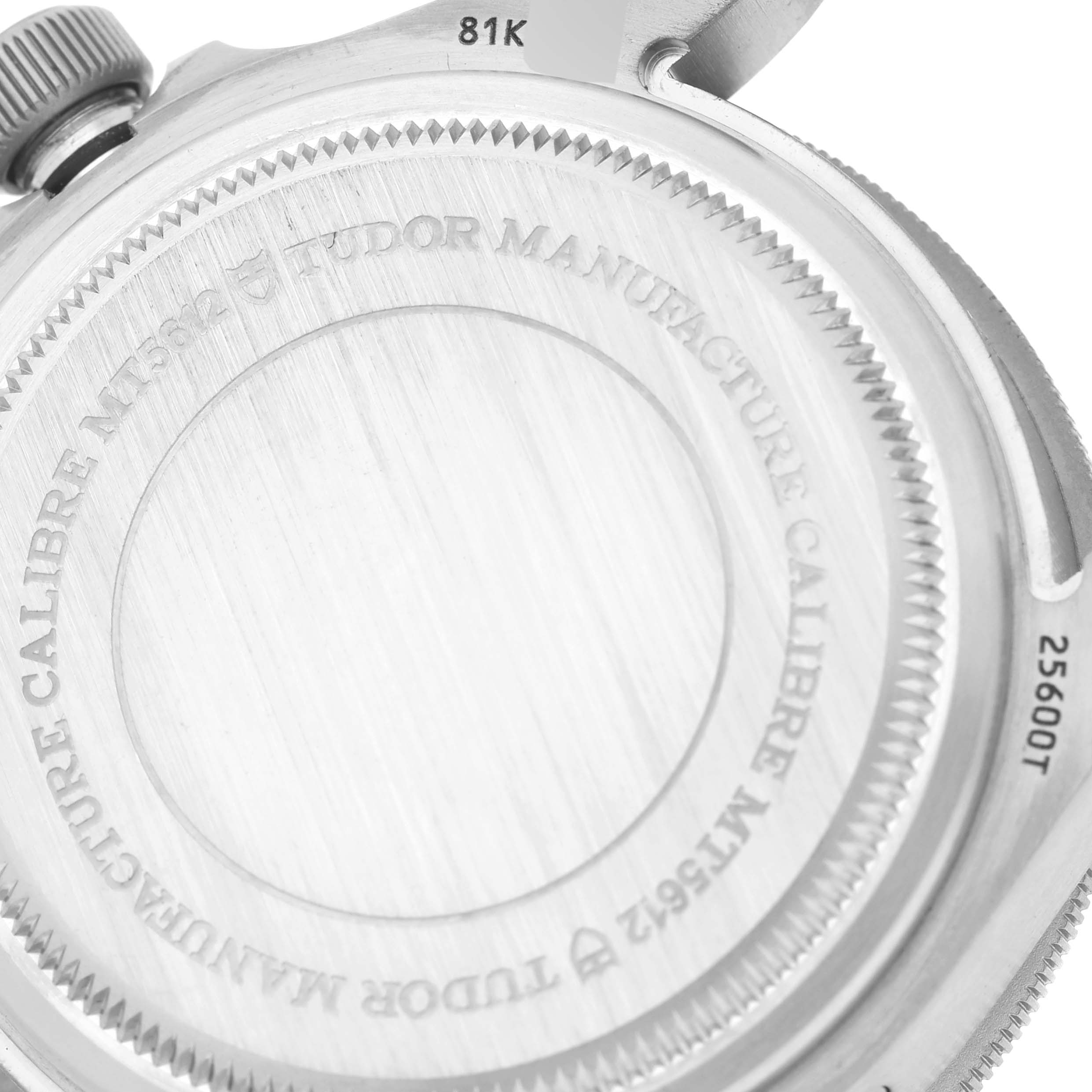 The image shows the engraved back case of a Tudor Pelagos 25600TB Men's Titanium Blue Dial 25600TB Men's Titanium Blue Dial watch, detailing the model and brand.