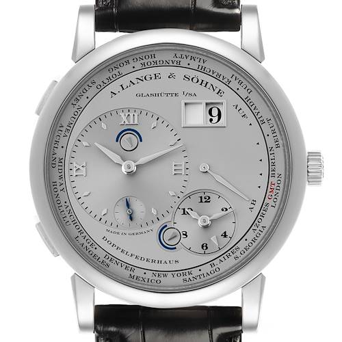 The A. Lange & Söhne Lange 1 watch is shown from a front angle, displaying the dial, hands, subdials, and date window.