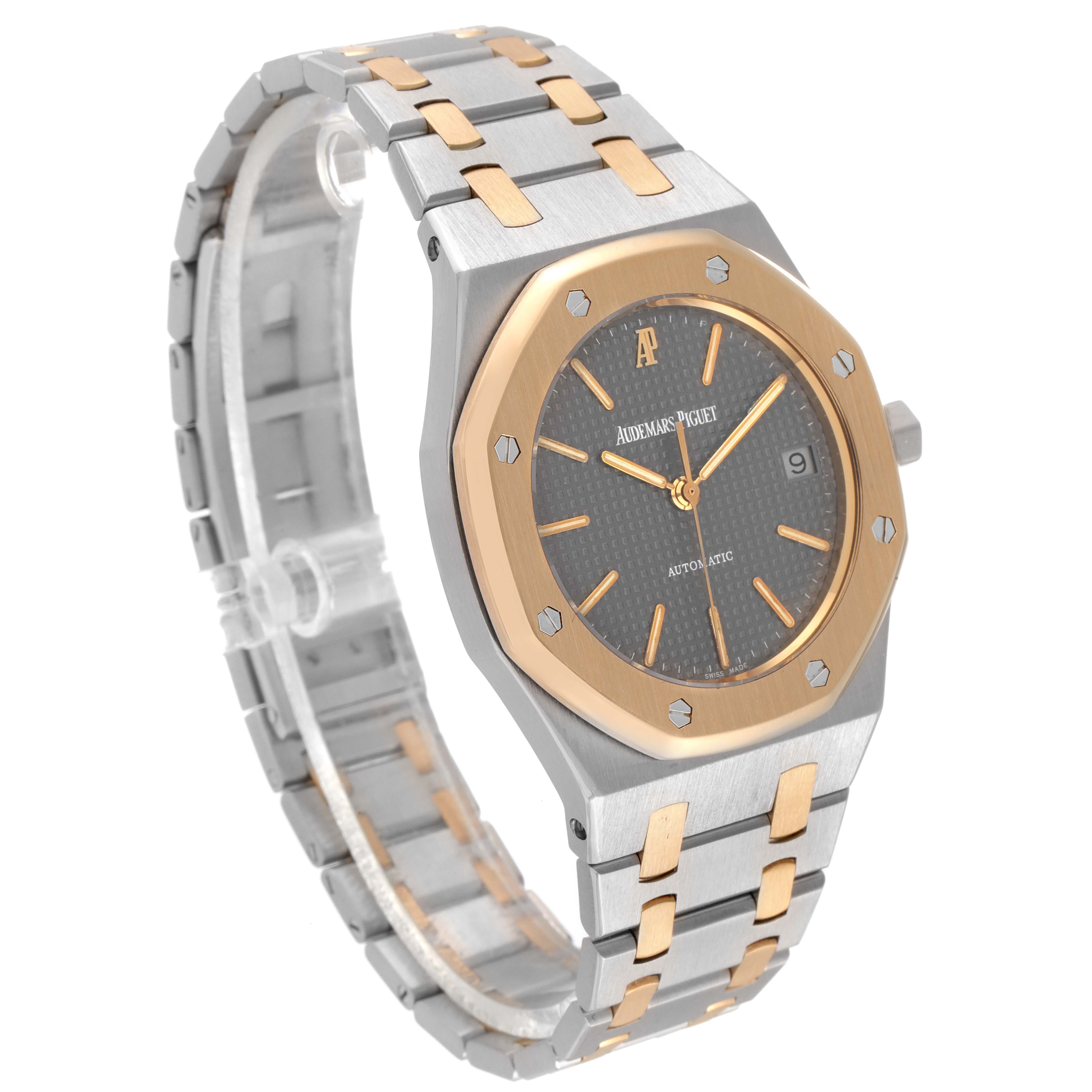 The image shows an Audemars Piguet Royal Oak 14790SA.OO.0789SA.01 Men's Steel and Gold (two tone) Grey Dial 14790SA.OO.0789SA.01 Men's Steel and Gold (two tone) Grey Dial watch at a three-quarter angle, displaying the stainless steel and gold bracelet, bezel, and dial.