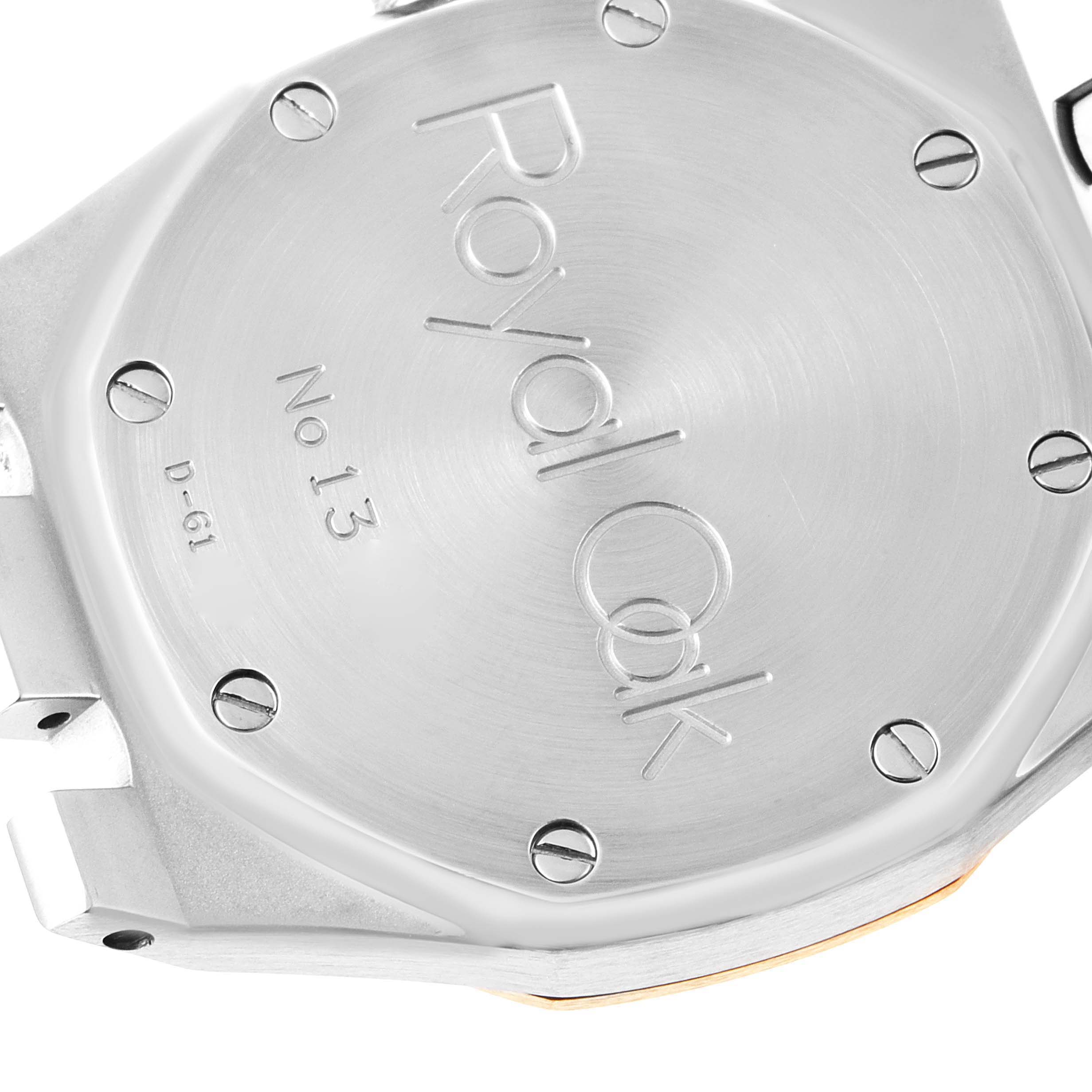 This image shows the caseback of an Audemars Piguet Royal Oak 14790SA.OO.0789SA.01 Men's Steel and Gold (two tone) Grey Dial 14790SA.OO.0789SA.01 Men's Steel and Gold (two tone) Grey Dial watch, highlighting the engraved model name and serial number.
