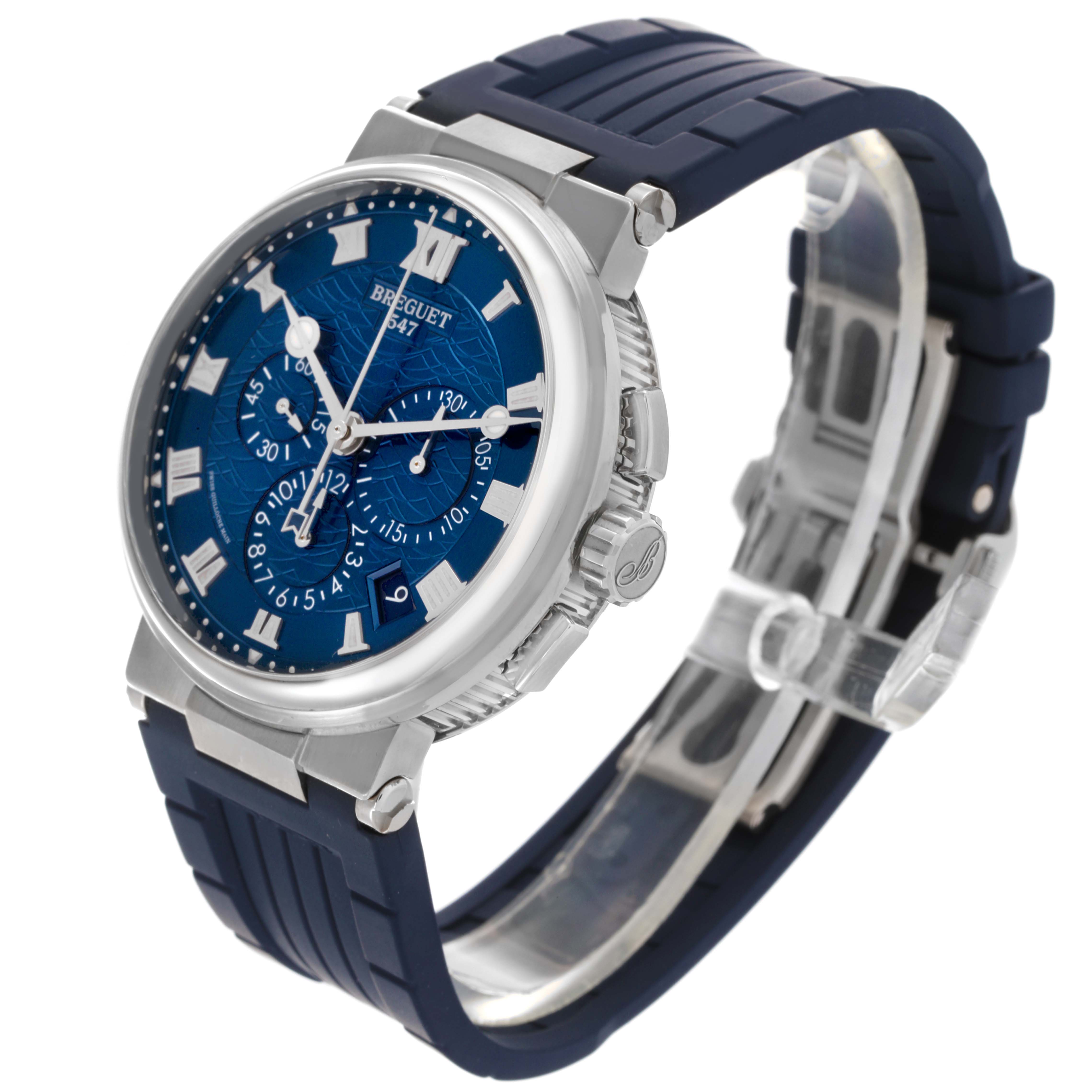 The Breguet Marine 5527BB/Y2/9WV Men's White Gold Blue Dial 5527BB/Y2/9WV Men's White Gold Blue Dial watch is shown at a three-quarter angle, highlighting its face, bezel, crown, and strap.