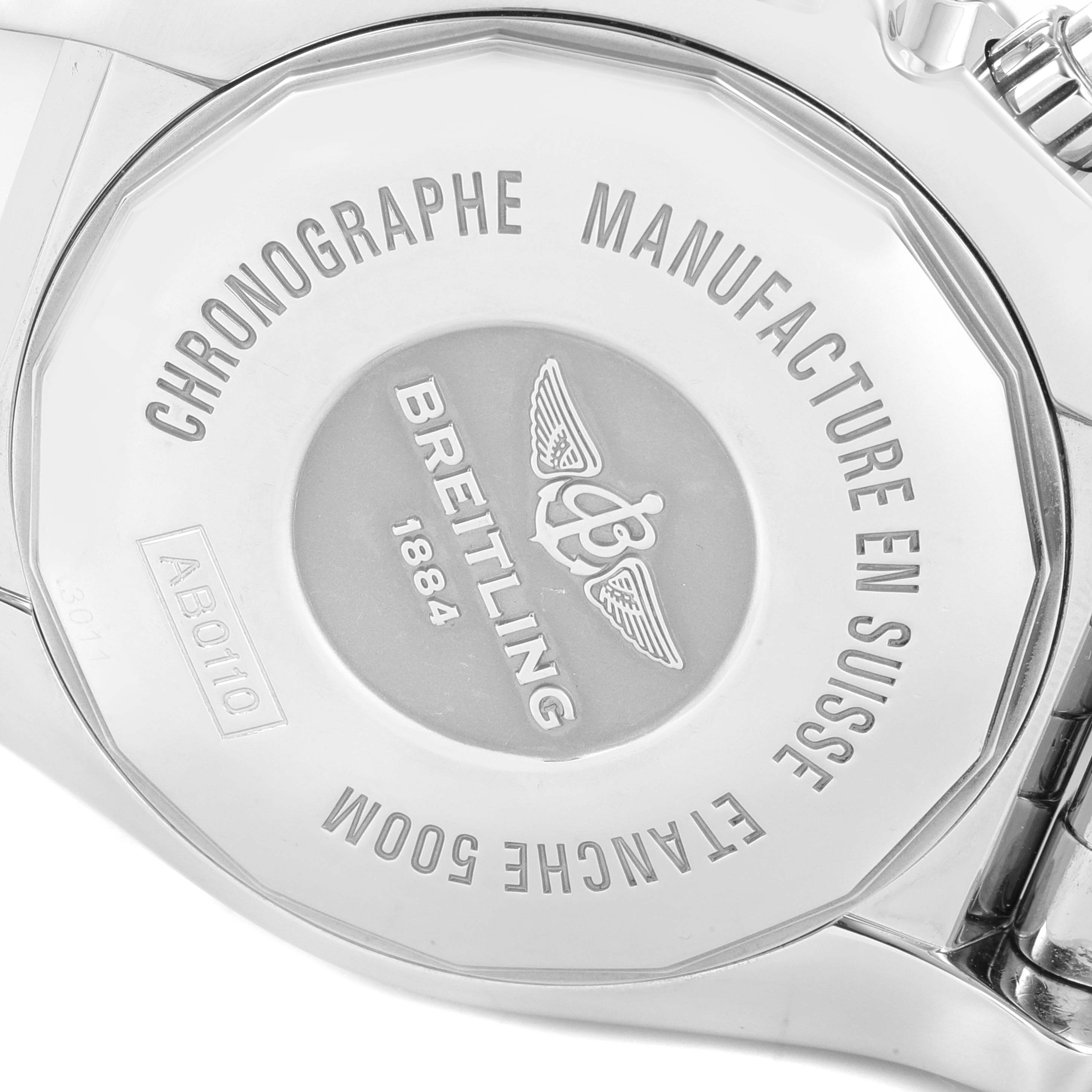The image shows the case back of a Breitling Chronomat AB0110 Men's Stainless Steel Mother of Pearl Dial AB0110 Men's Stainless Steel Mother of Pearl Dial watch, displaying engravings and branding details.