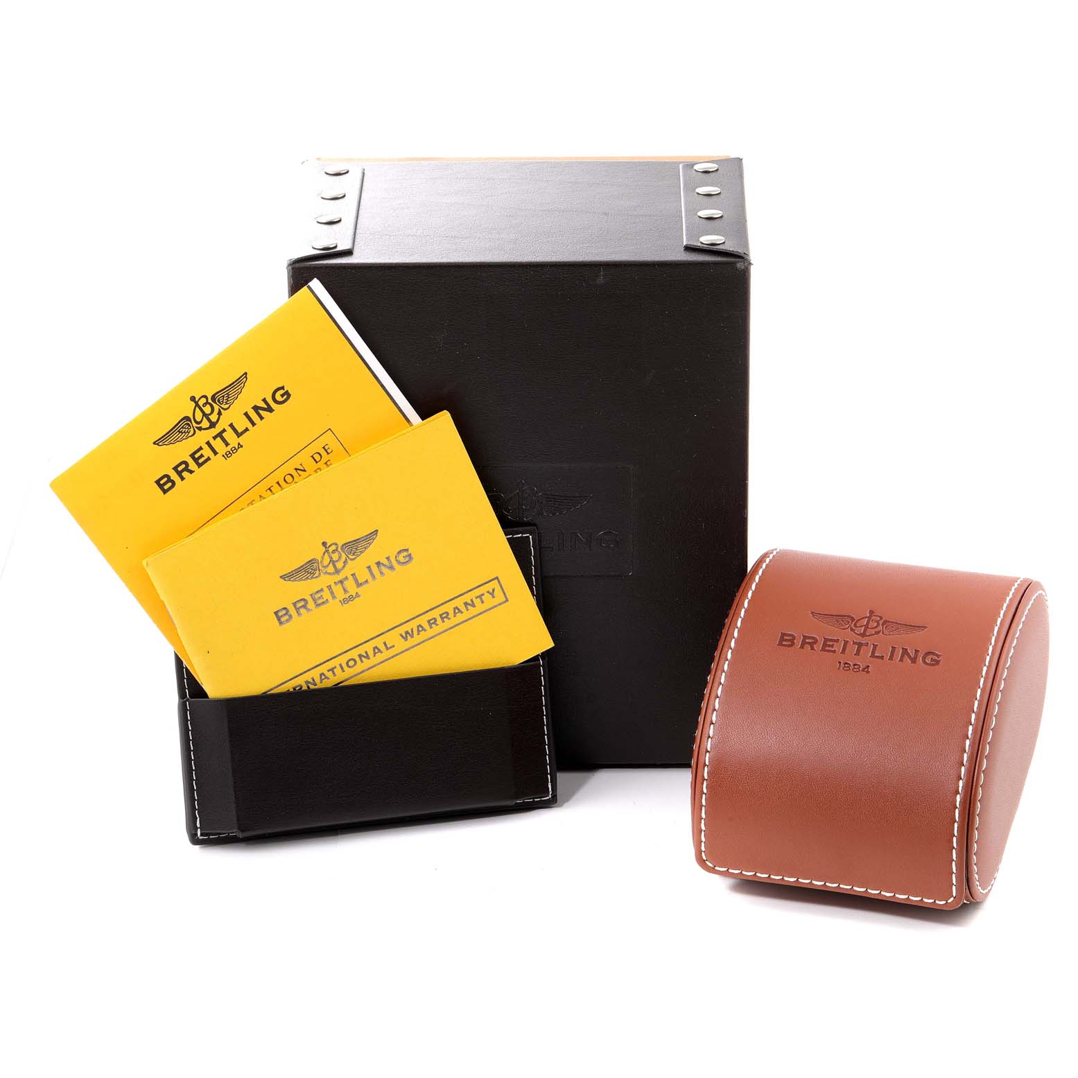 The image shows packaging and accessories for a Breitling Chronomat AB0110 Men's Stainless Steel Mother of Pearl Dial AB0110 Men's Stainless Steel Mother of Pearl Dial watch, including a black box, leather case, and warranty booklets.