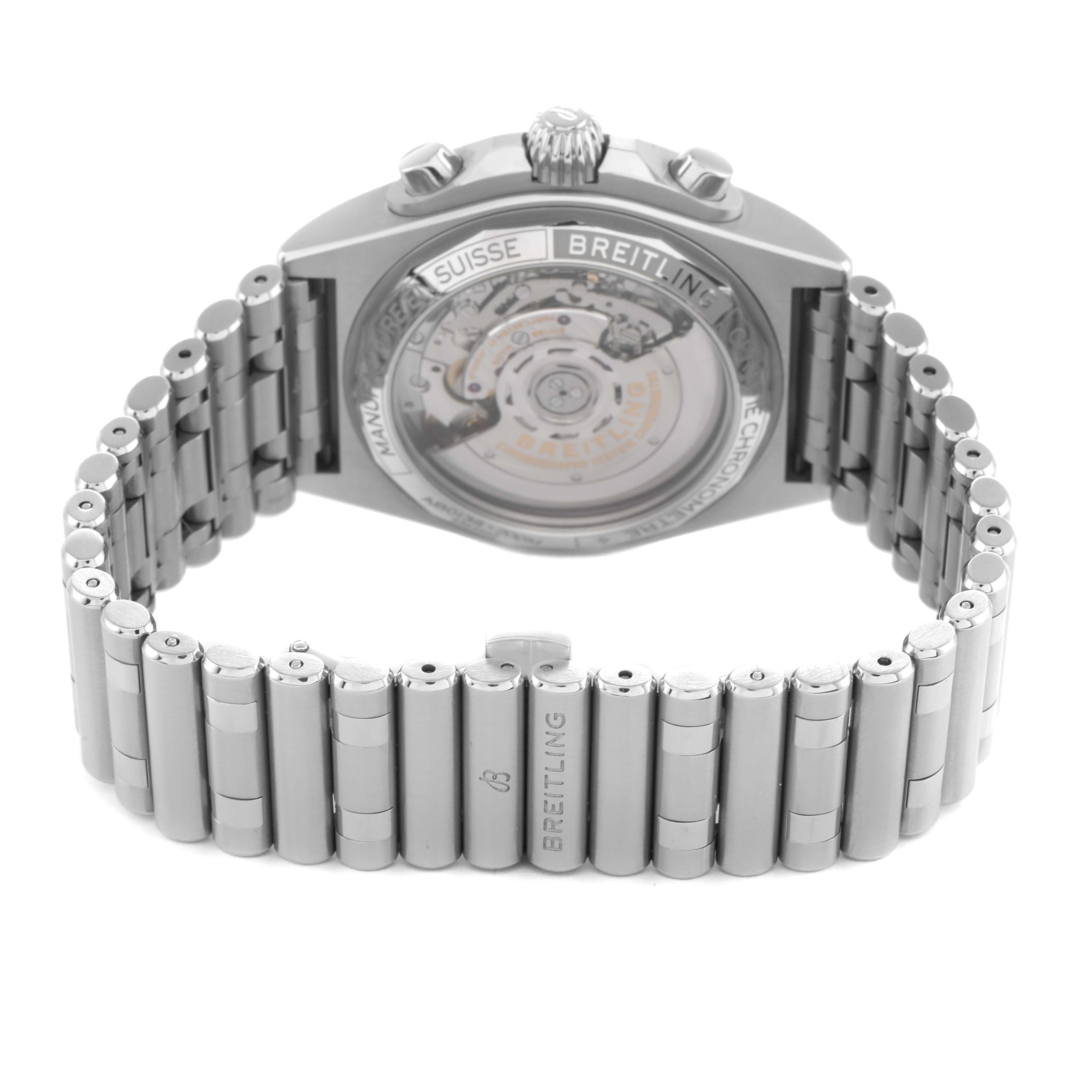 The image shows the back view of the Breitling Chronomat AB0134 Men's Stainless Steel Silver Dial, highlighting the automatic movement and metal bracelet.