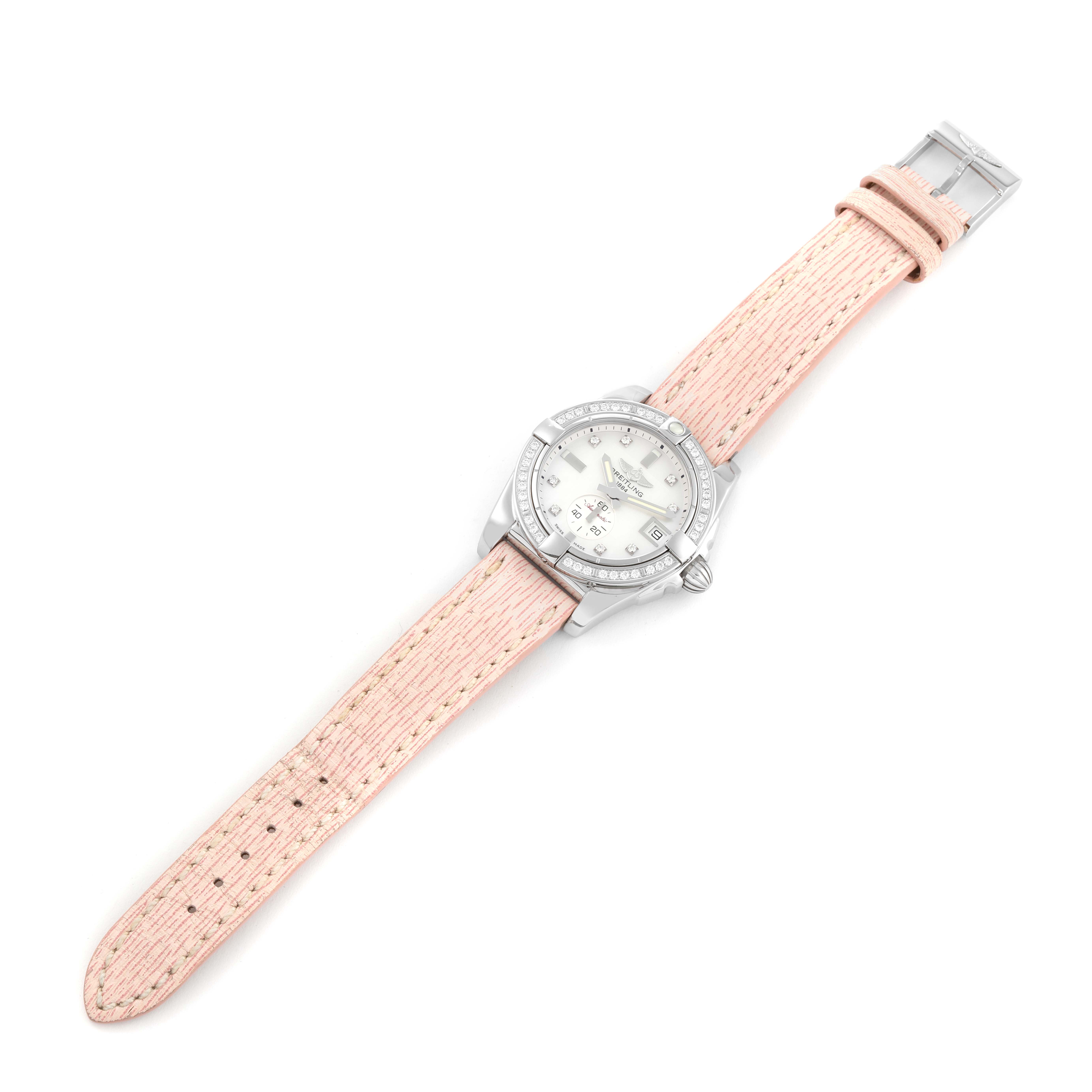 The Breitling A3733053/A717 Women's Stainless Steel Mother of Pearl Dial A3733053/A717 Women's Stainless Steel Mother of Pearl Dial Galactic 36 Mother Of Pearl Dial Diamond Steel Ladies Watch A37330 is shown from an overhead angle, displaying the face, strap, and buckle.