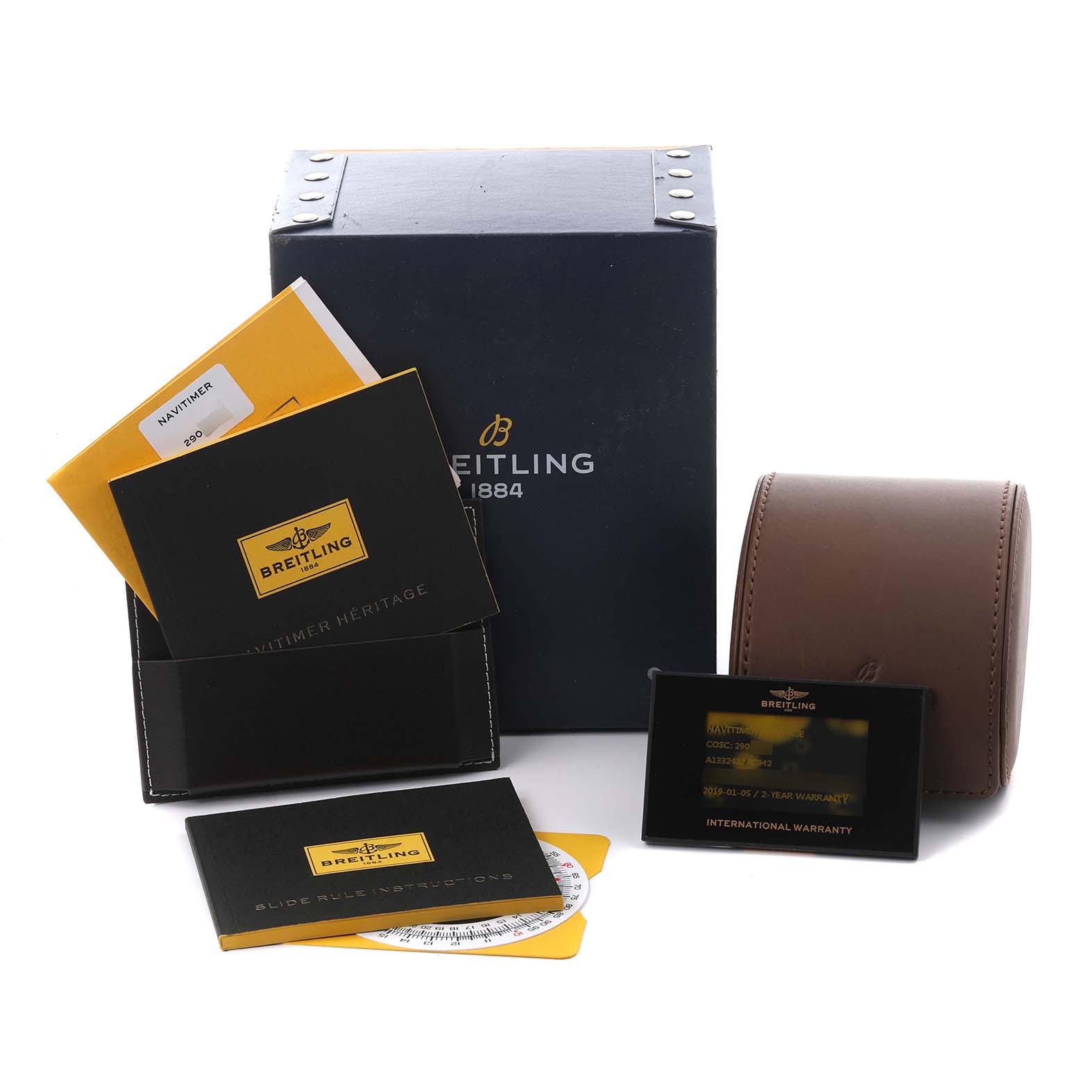 The image shows Breitling Navitimer A1332412/C942 Men's Stainless Steel Blue Dial A1332412/C942 Men's Stainless Steel Blue Dial watch accessories including a box, manual, warranty card, and a travel pouch.