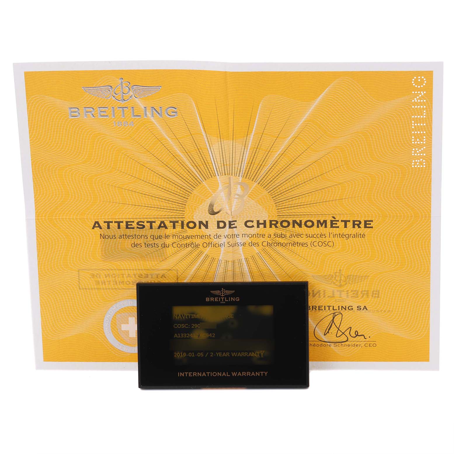 The image shows the Breitling Navitimer A1332412/C942 Men's Stainless Steel Blue Dial A1332412/C942 Men's Stainless Steel Blue Dial's warranty card and chronometer certificate.