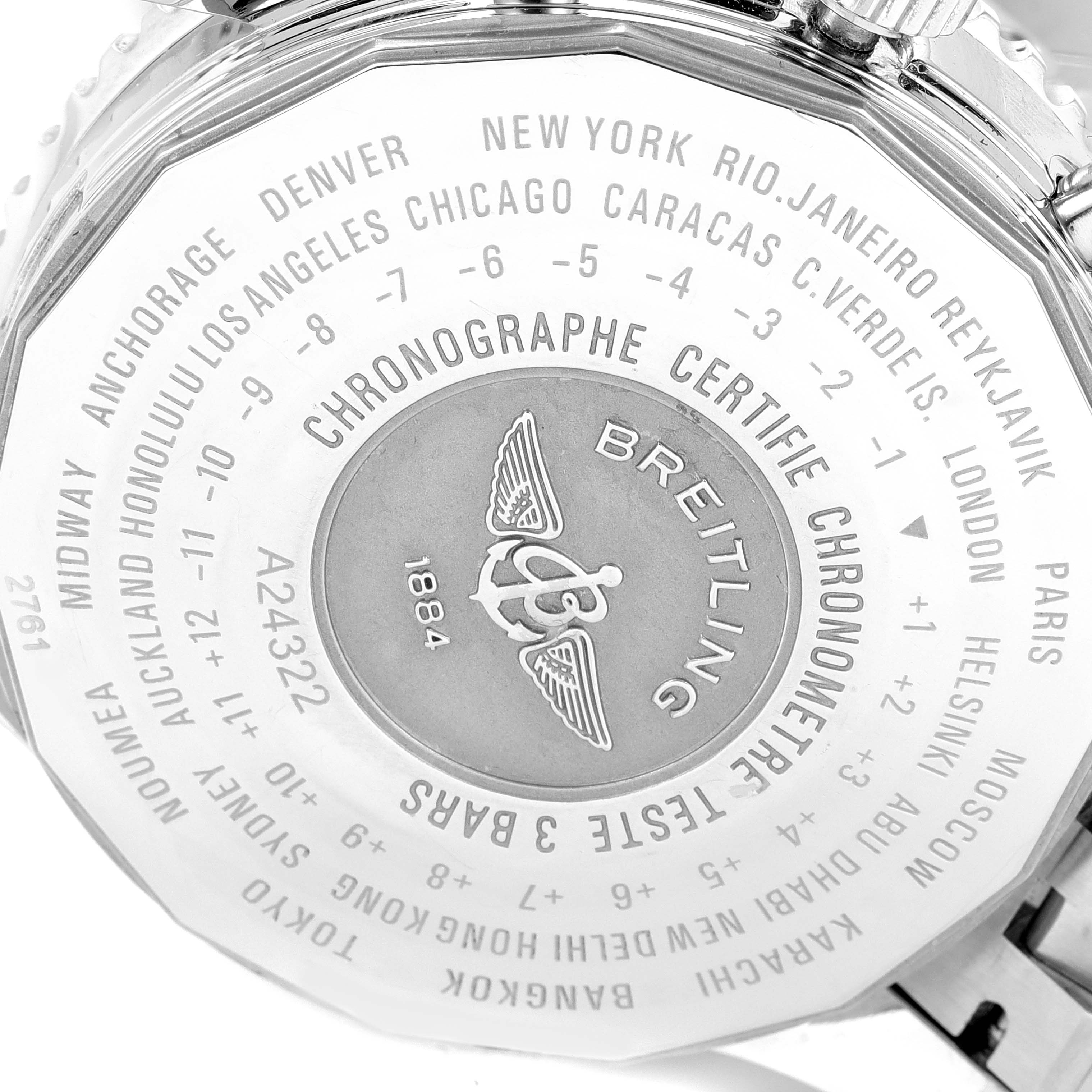 The image shows the back case of a Breitling Navitimer A24322 Men
s Stainless Steel Silver Dial A24322 Men
s Stainless Steel Silver Dial watch, displaying city names and time zones.