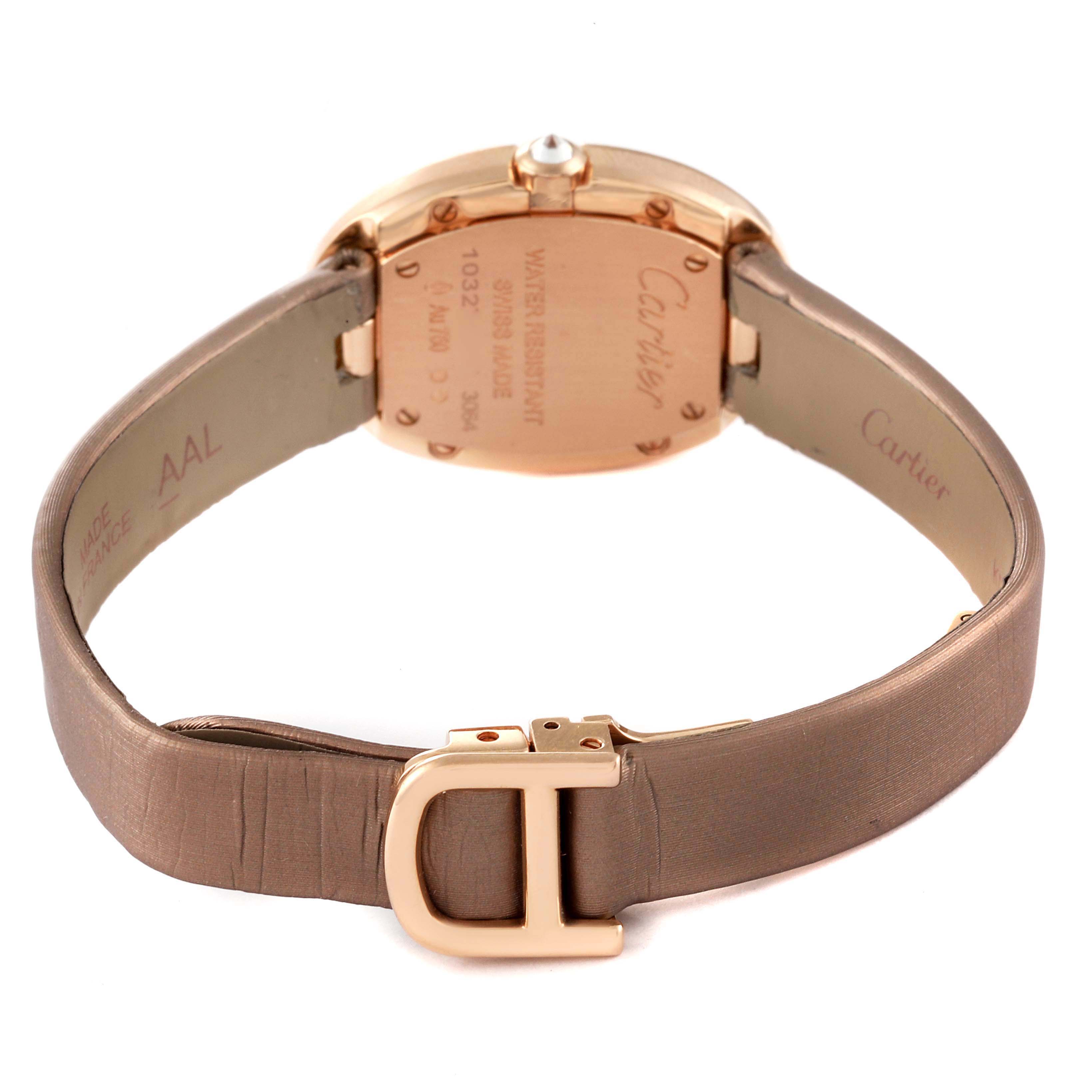 The image shows the back view of the Cartier Baignoire WB520004 Women's Rose Gold Silver Dial WB520004 Women's Rose Gold Silver Dial watch, focusing on the case back and the leather strap with its buckle.