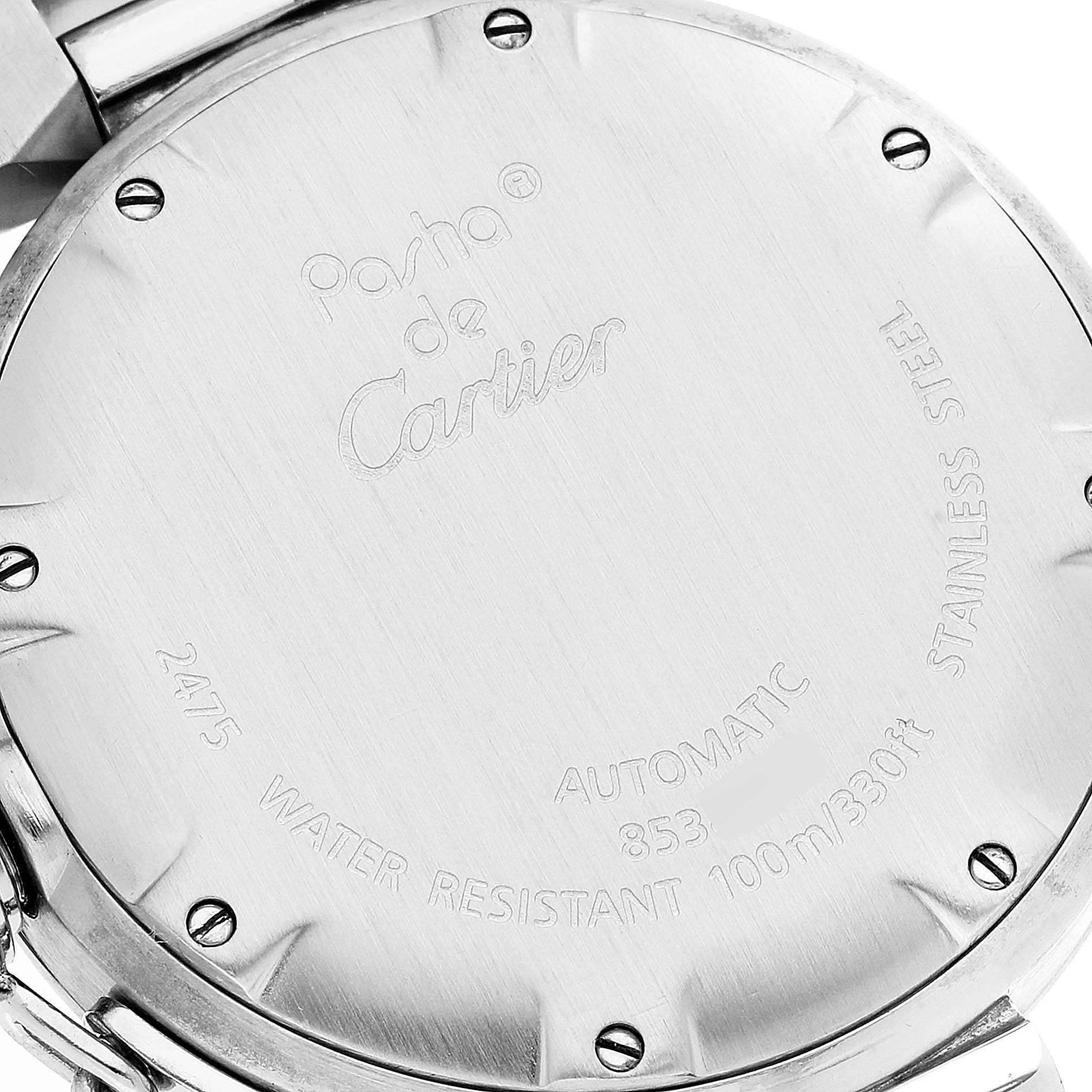The image shows the back case of a Cartier Pasha W31055M7 Women's Stainless Steel White Dial W31055M7 Women's Stainless Steel White Dial watch, highlighting its markings and screws.