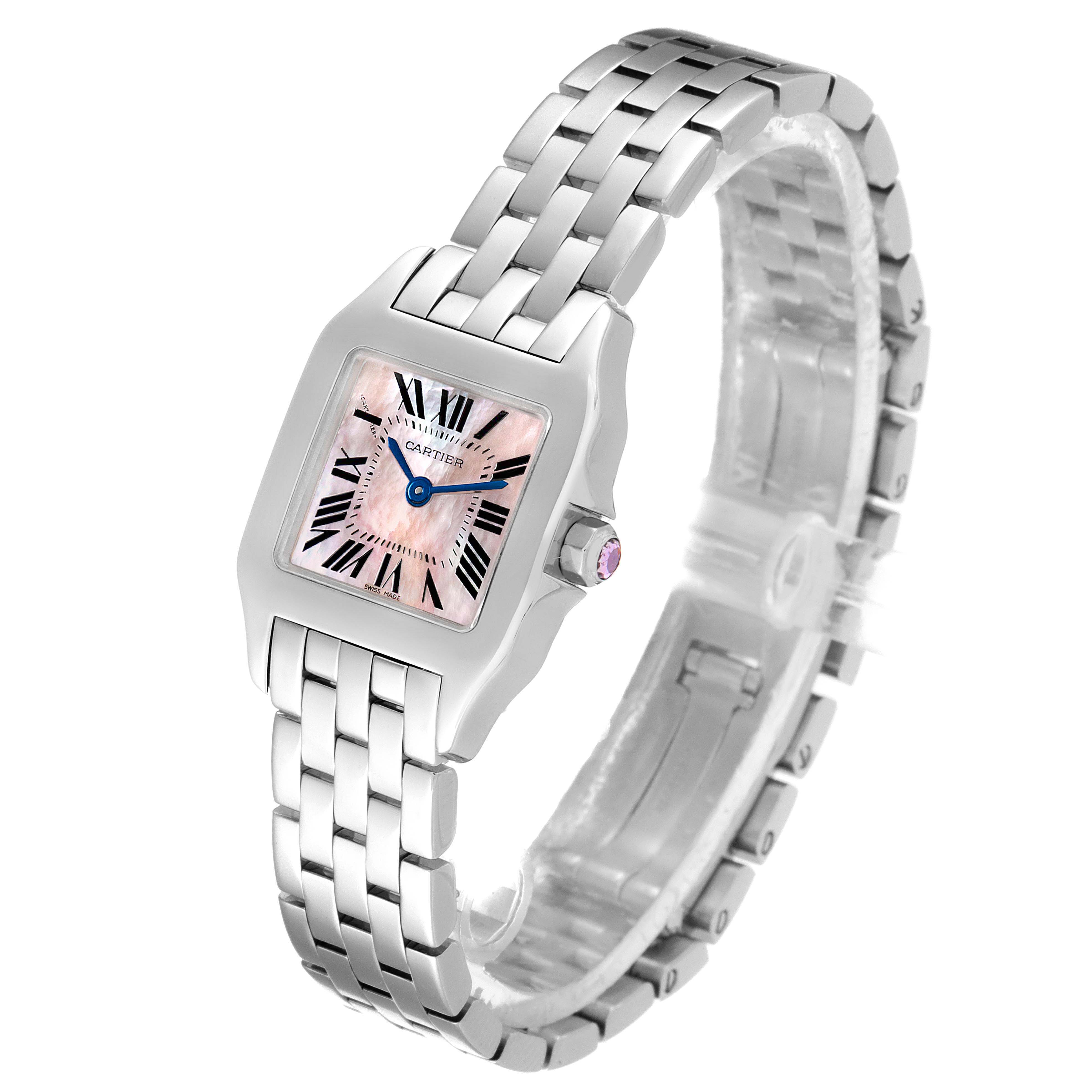 The Cartier Santos Demoiselle W25075Z5 Women's Stainless Steel Mother of Pearl Dial W25075Z5 Women's Stainless Steel Mother of Pearl Dial watch is shown at an angle highlighting its face, bracelet, and crown.
