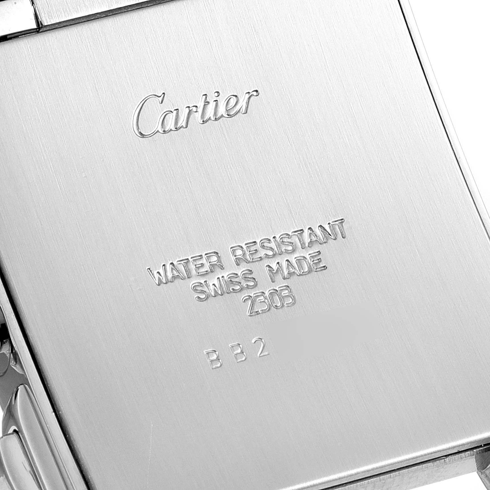 This image shows the back of a Cartier Tank Française watch, highlighting brand engraving and water-resistant specifications.