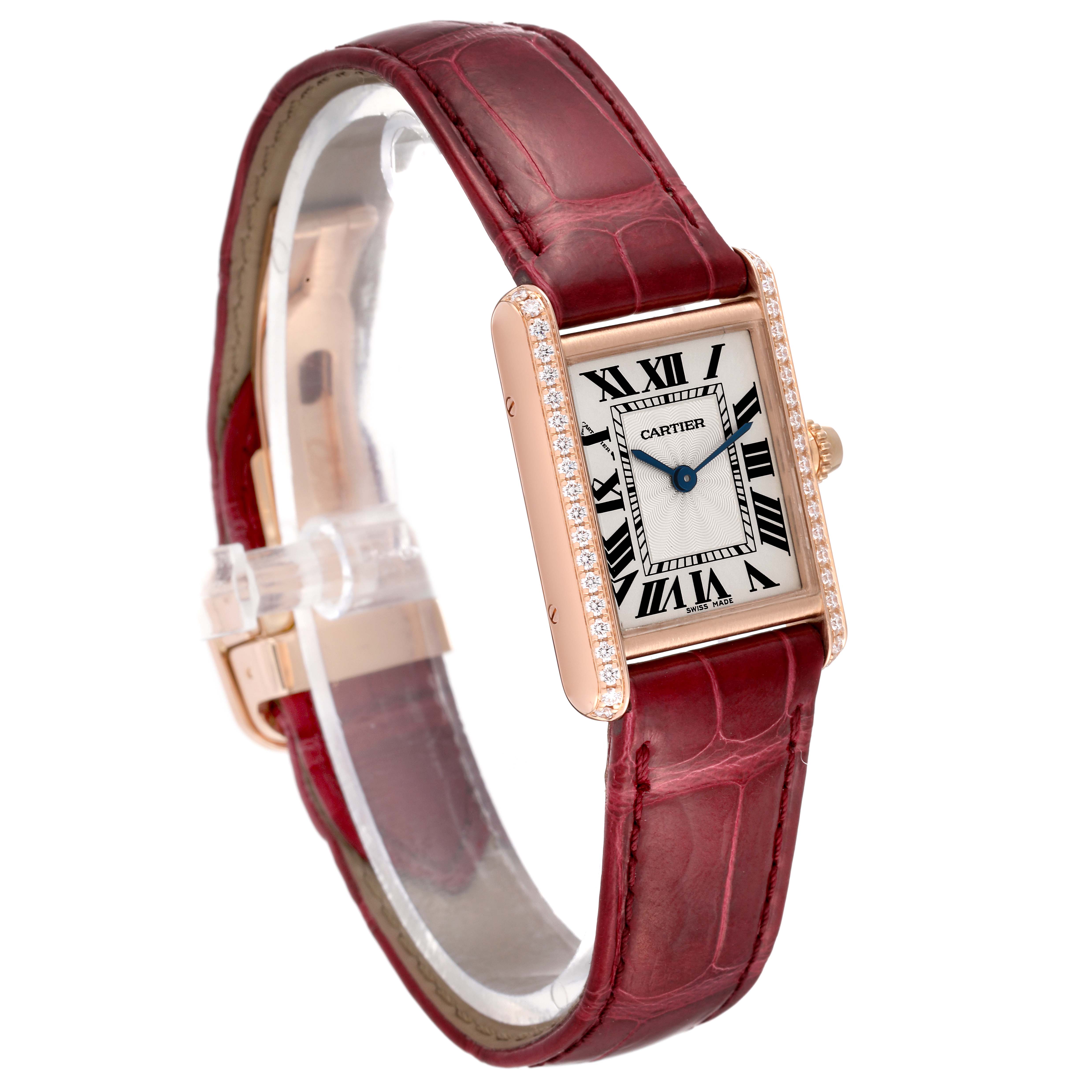 The image shows a Cartier Tank Louis WJTA0010 Women's Rose Gold Silver Dial WJTA0010 Women's Rose Gold Silver Dial watch at a three-quarter angle, displaying its face, diamond bezel, and burgundy leather strap.