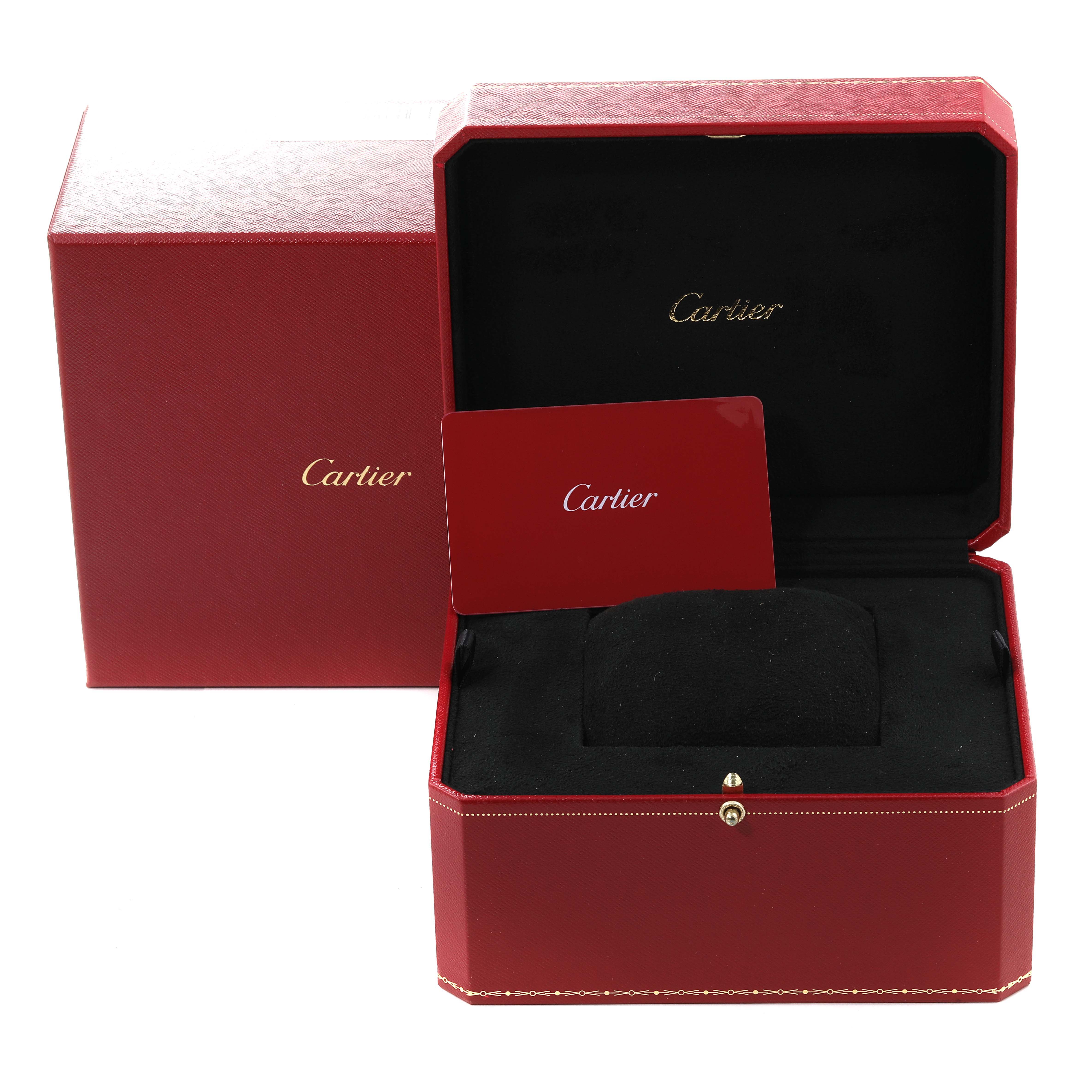The image shows the red Cartier box for the Tank Louis model, with an open lid, display cushion, and Cartier card.