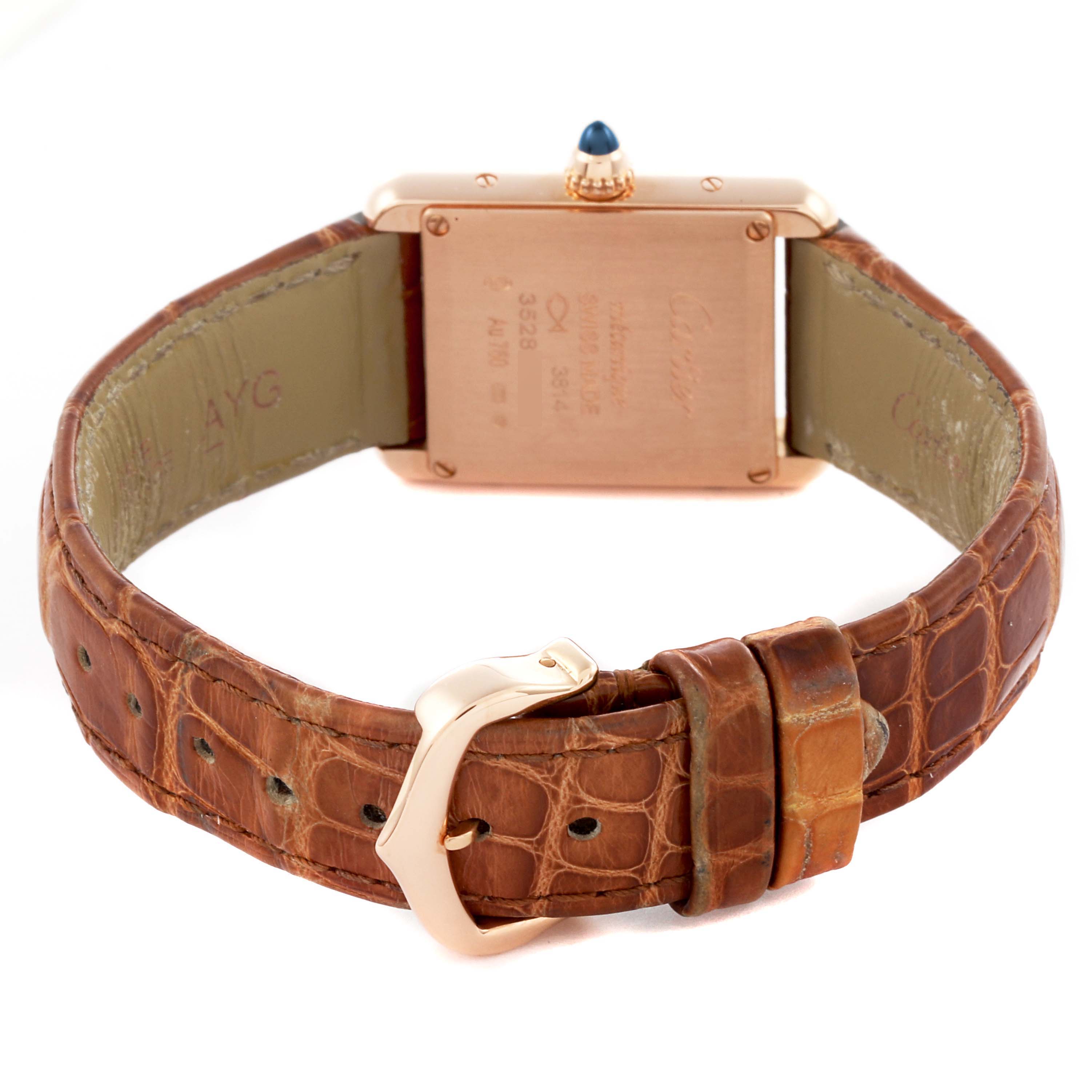 The image shows the back view of a Cartier Tank Louis WGTA0010 Women's Yellow Gold Silver Dial WGTA0010 Women's Yellow Gold Silver Dial watch, featuring a leather strap and a visible buckle.