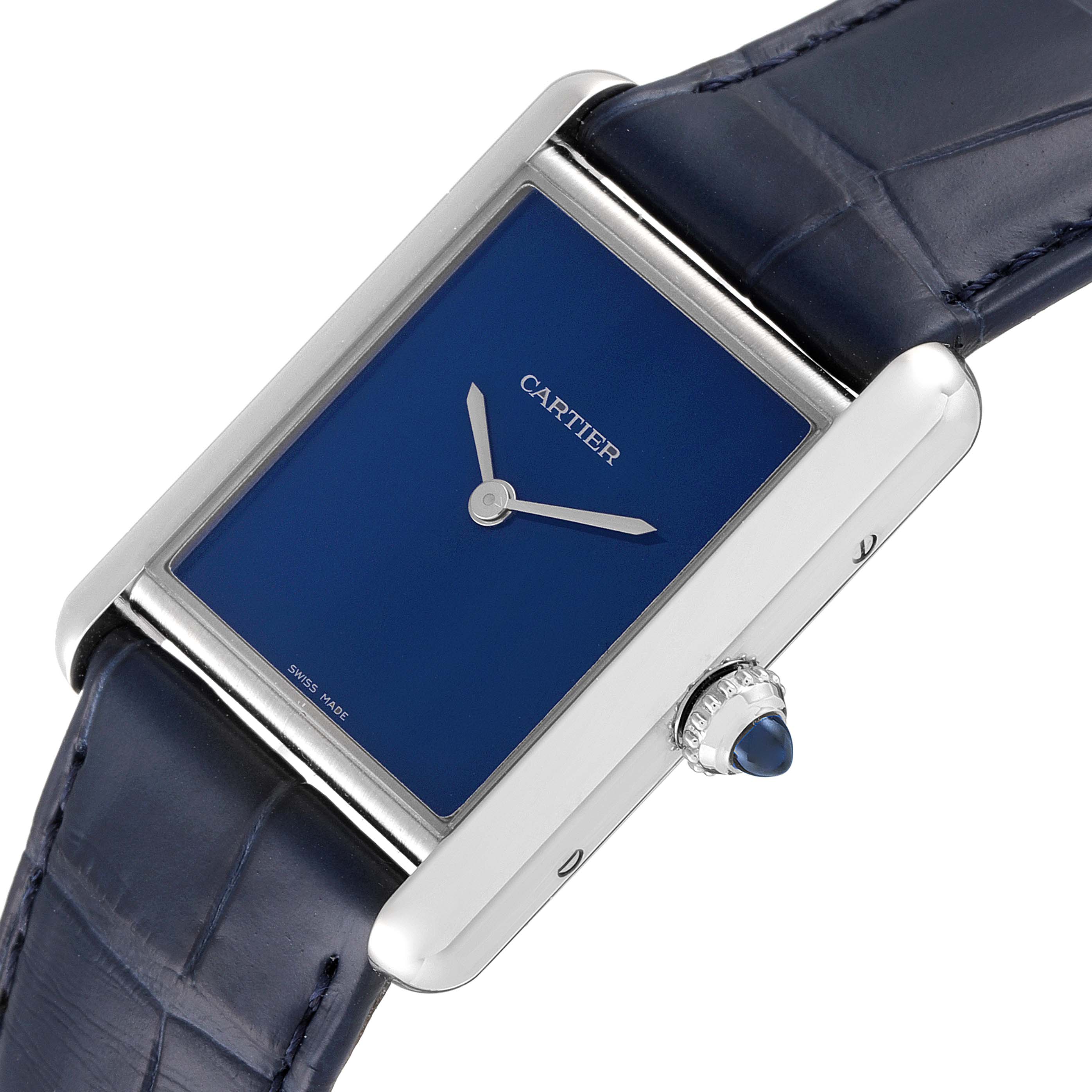 This image shows a close-up, side angle of the Cartier Tank Must WSTA0055 Men's Stainless Steel Blue Dial WSTA0055 Men's Stainless Steel Blue Dial watch, focusing on the dial, crown, and strap.