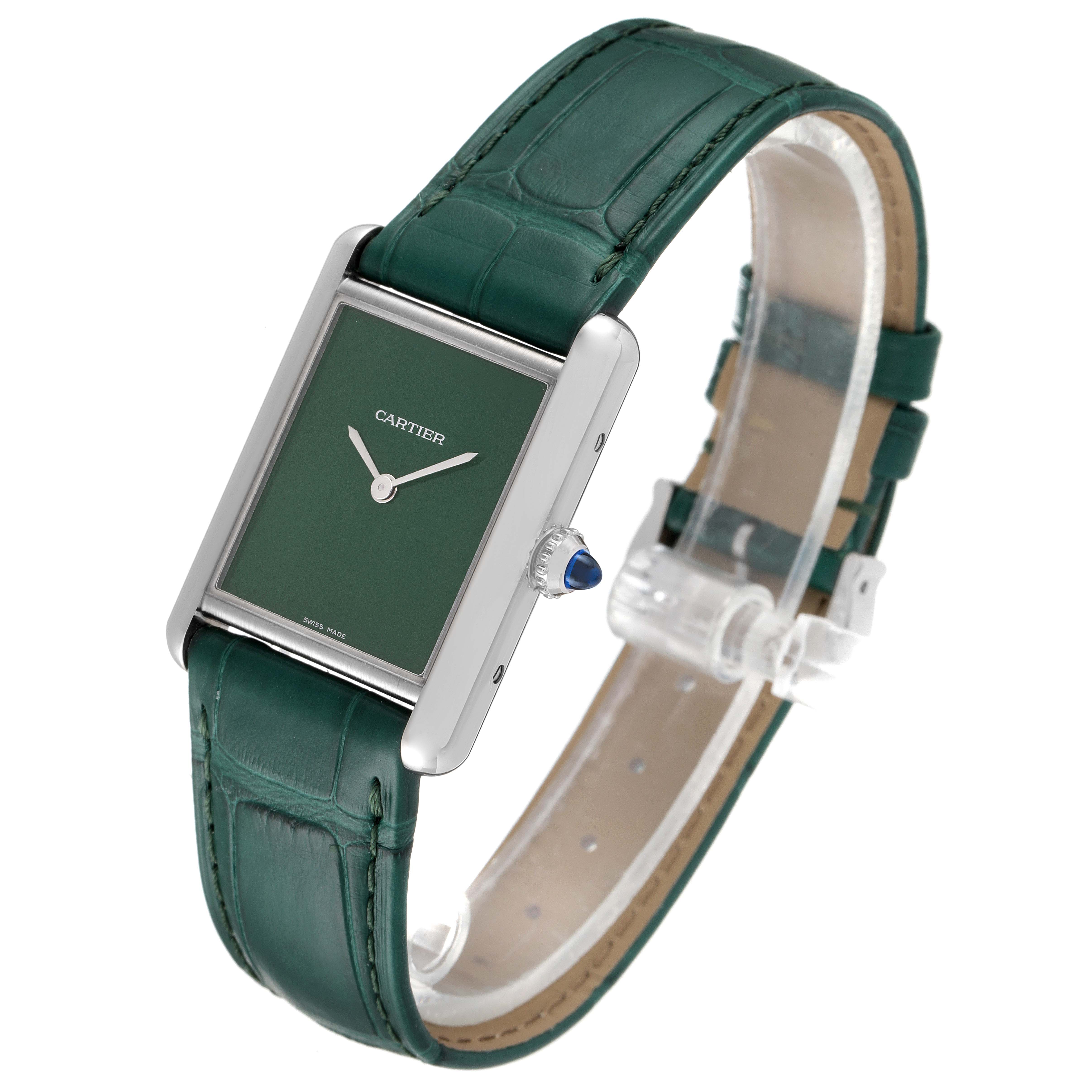 The image shows a Cartier Tank Must WSTA0056 Women's Stainless Steel Green Dial WSTA0056 Women's Stainless Steel Green Dial watch at a three-quarter angle, highlighting its green face and leather strap.