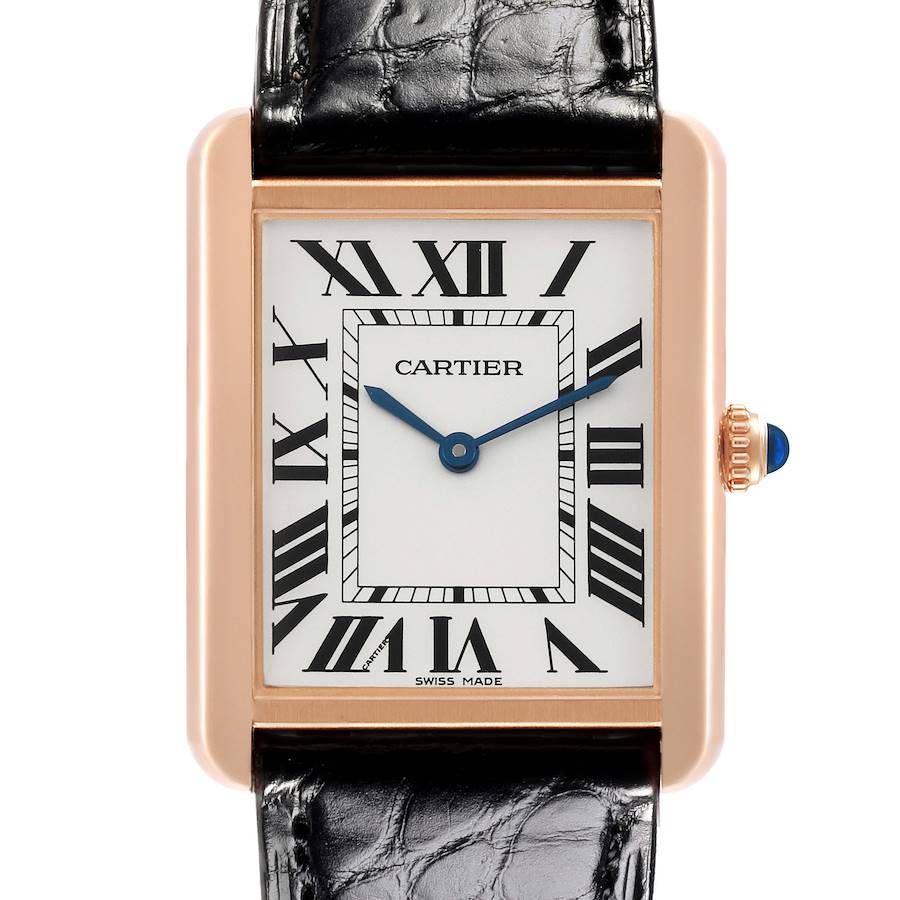 The Cartier Tank Solo watch is shown from the front, highlighting the rectangular dial, Roman numerals, and crown with a blue gem.