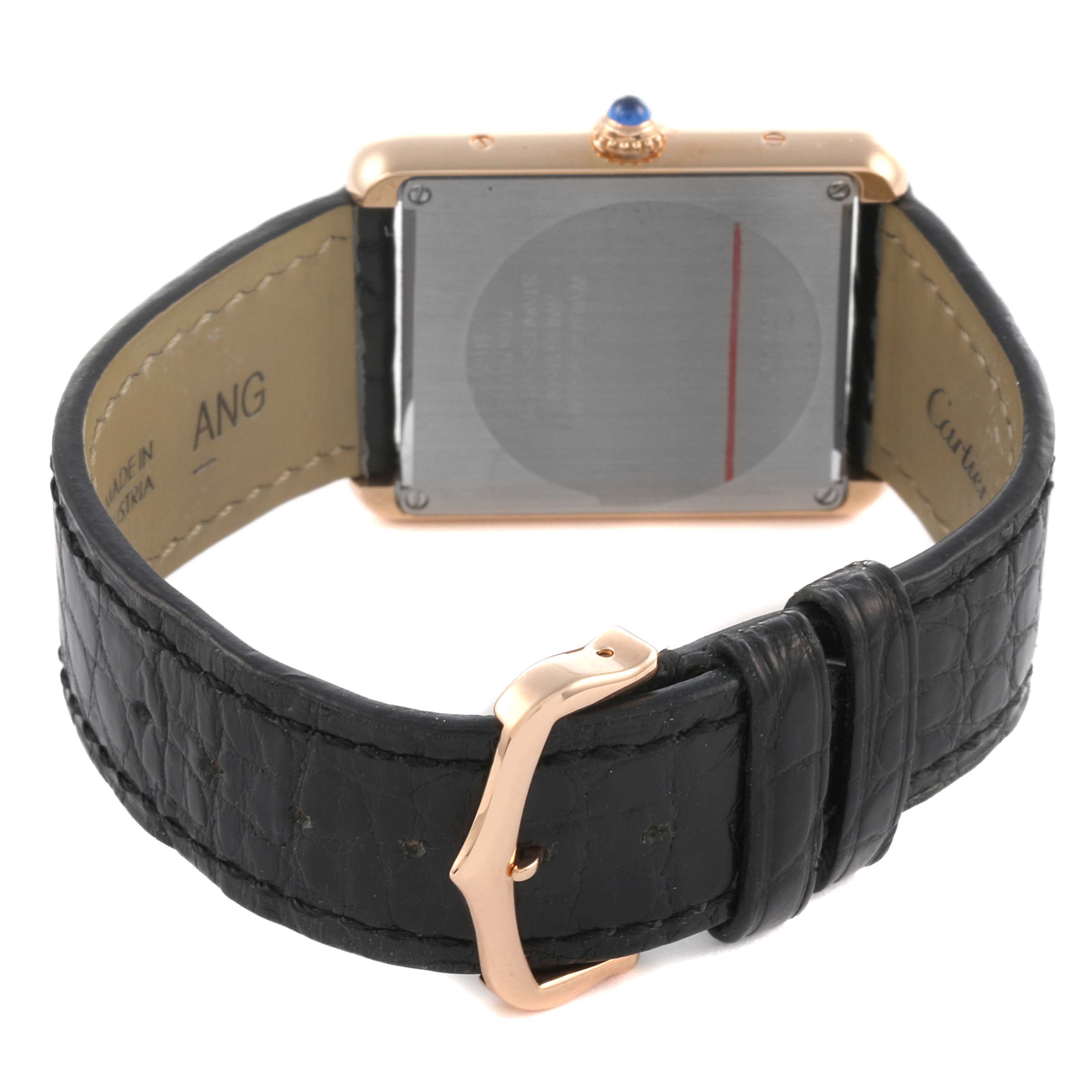 The Cartier Tank Solo W5200025 Men
s Steel and Gold (two tone) Silver Dial W5200025 Men
s Steel and Gold (two tone) Silver Dial watch is shown from the back, highlighting the clasp and leather strap.