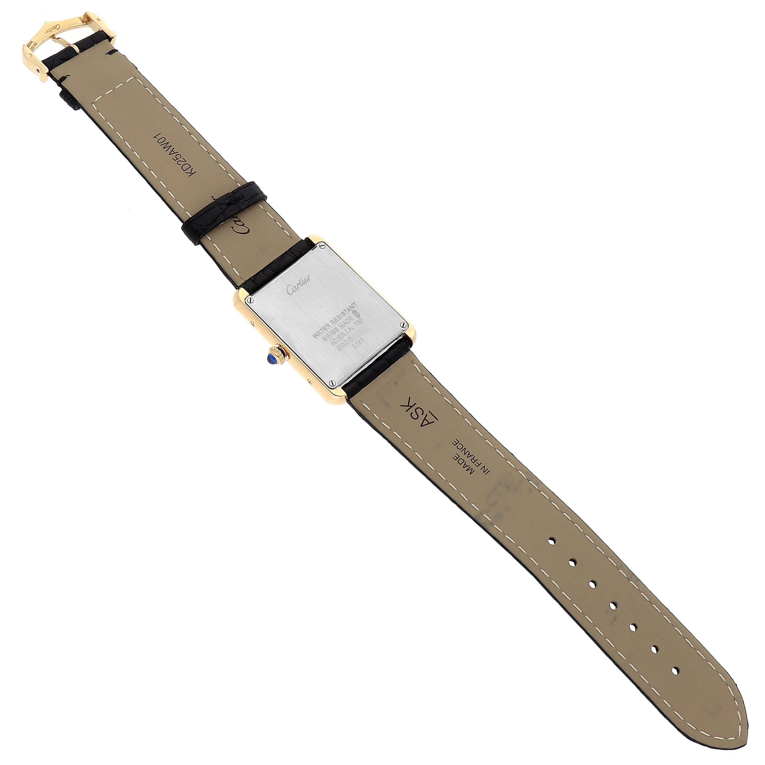 The Cartier Tank Solo W5200004 Men's Steel and Gold (two tone) Silver Dial W5200004 Men's Steel and Gold (two tone) Silver Dial watch is shown from the back, displaying the case back and leather strap.