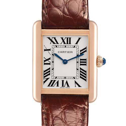 The Cartier Tank Solo watch is shown from the front, displaying its rectangular face, Roman numerals, and brown leather strap.