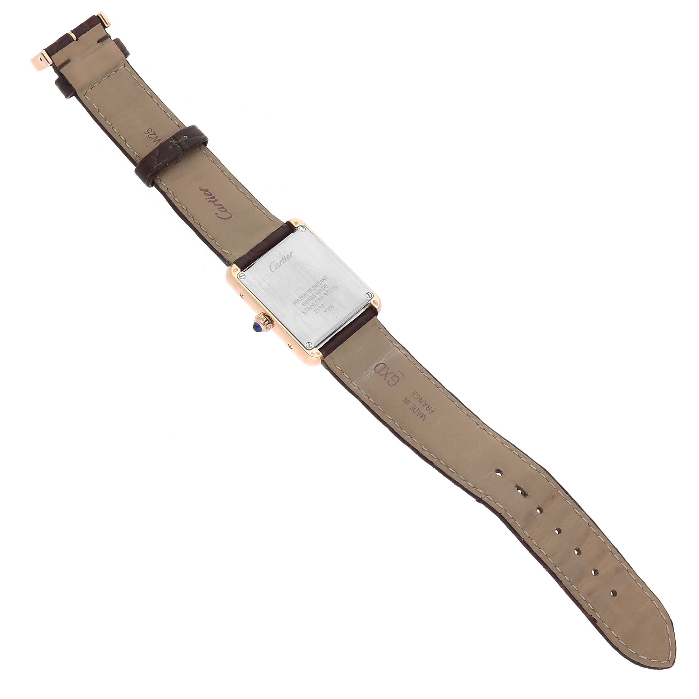 The Cartier Tank Solo W5200024 Women's Steel and Gold (two tone) Silver Dial W5200024 Women's Steel and Gold (two tone) Silver Dial watch is shown from the back, displaying the case back and leather strap.