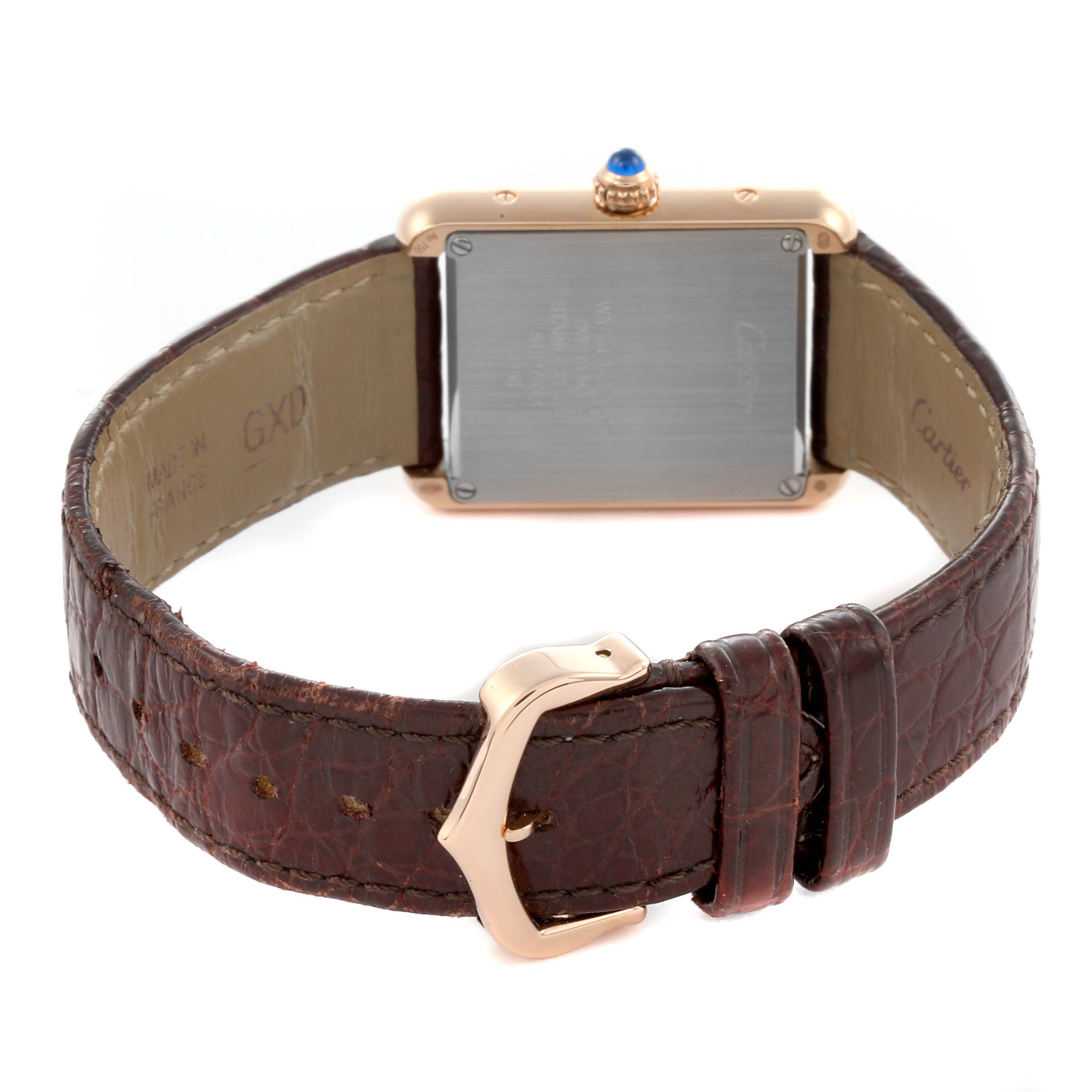 The image shows the back and side of the Cartier Tank Solo W5200024 Women's Steel and Gold (two tone) Silver Dial W5200024 Women's Steel and Gold (two tone) Silver Dial, highlighting the case back, leather strap, and buckle.