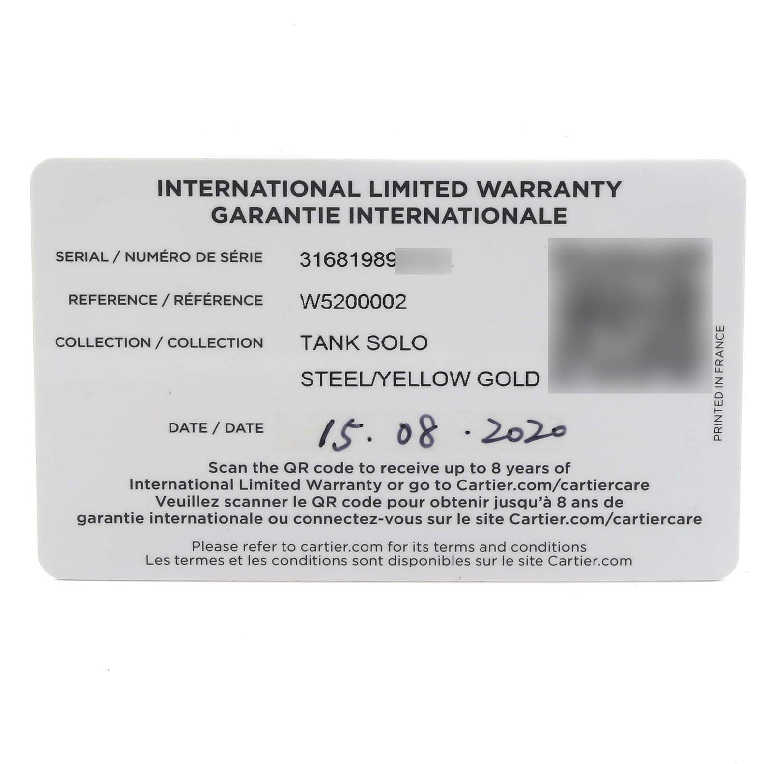 The image shows an international limited warranty card for the Cartier Tank Solo W5200002 Women's Steel and Gold (two tone) Silver Dial W5200002 Women's Steel and Gold (two tone) Silver Dial watch.