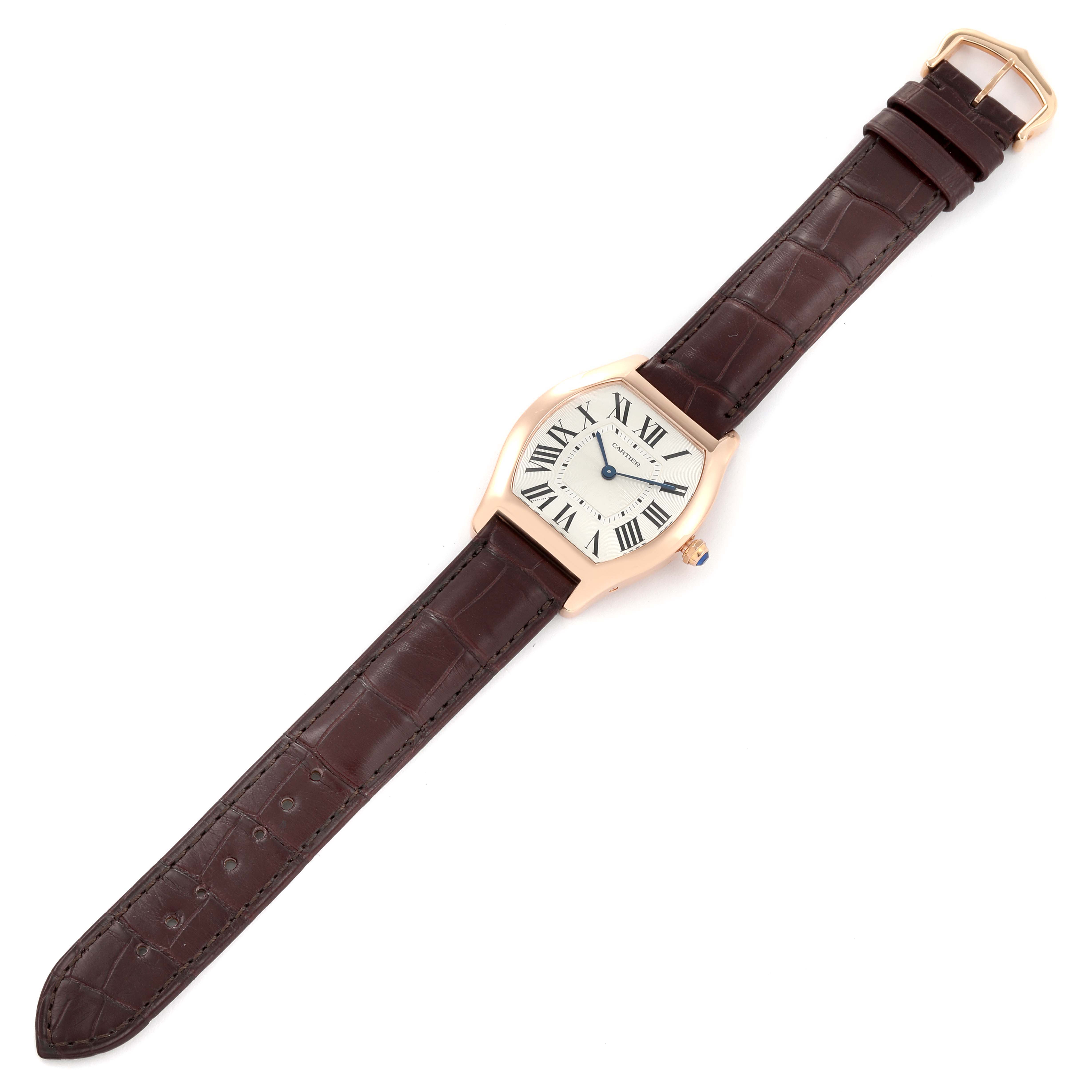 This image shows the front view of a Cartier Tortue W1556362 Men's Rose Gold Silver Dial W1556362 Men's Rose Gold Silver Dial watch with its brown leather strap fully extended.