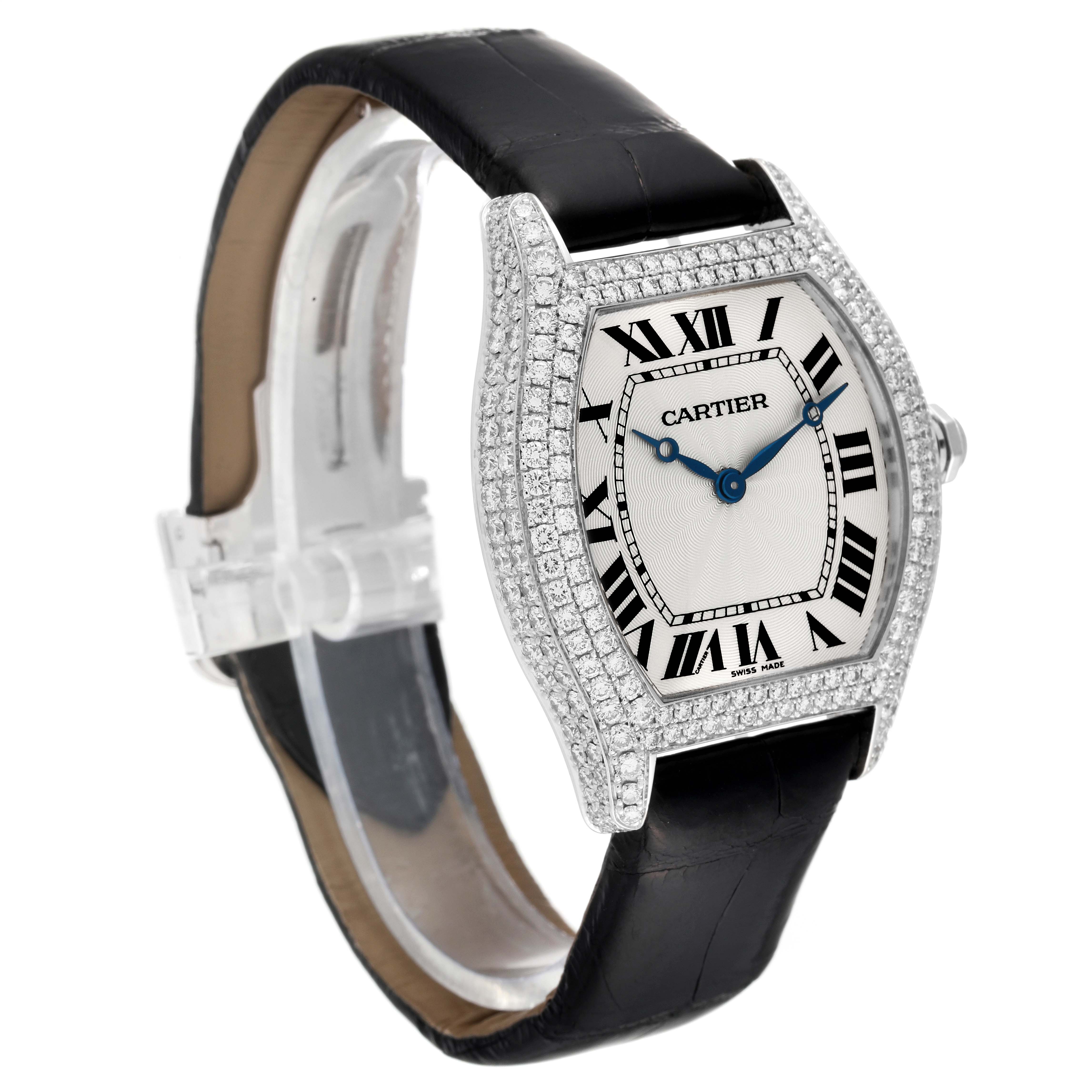 This image shows a Cartier Tortue WA504351 Men's White Gold Silver Dial WA504351 Men's White Gold Silver Dial watch at a slight angle, highlighting the face with Roman numerals and diamond-encrusted bezel.