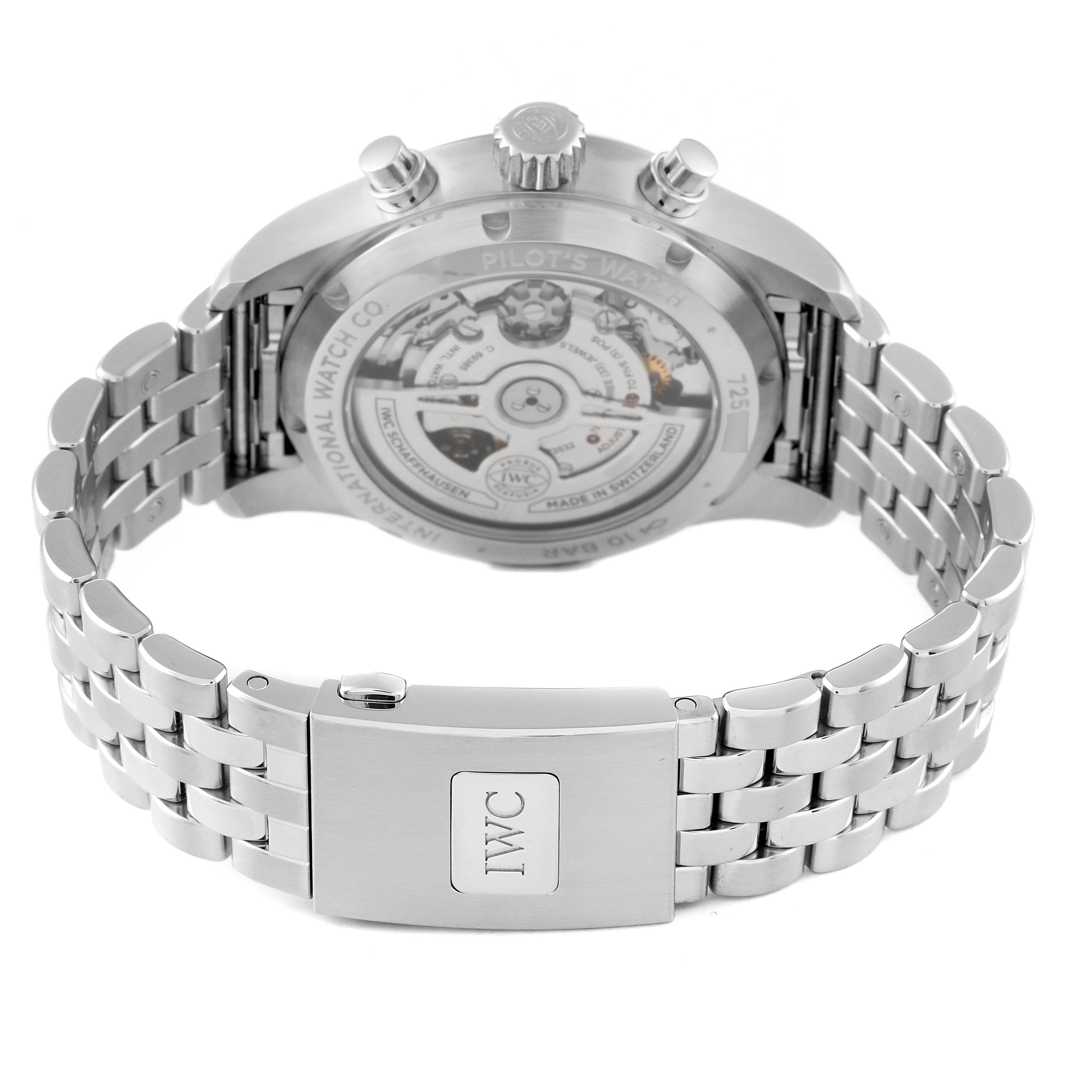 The image shows the back view of an IWC Pilot IW388104 Men's Stainless Steel Green Dial IW388104 Men's Stainless Steel Green Dial watch, showcasing its bracelet, clasp, and transparent case back.