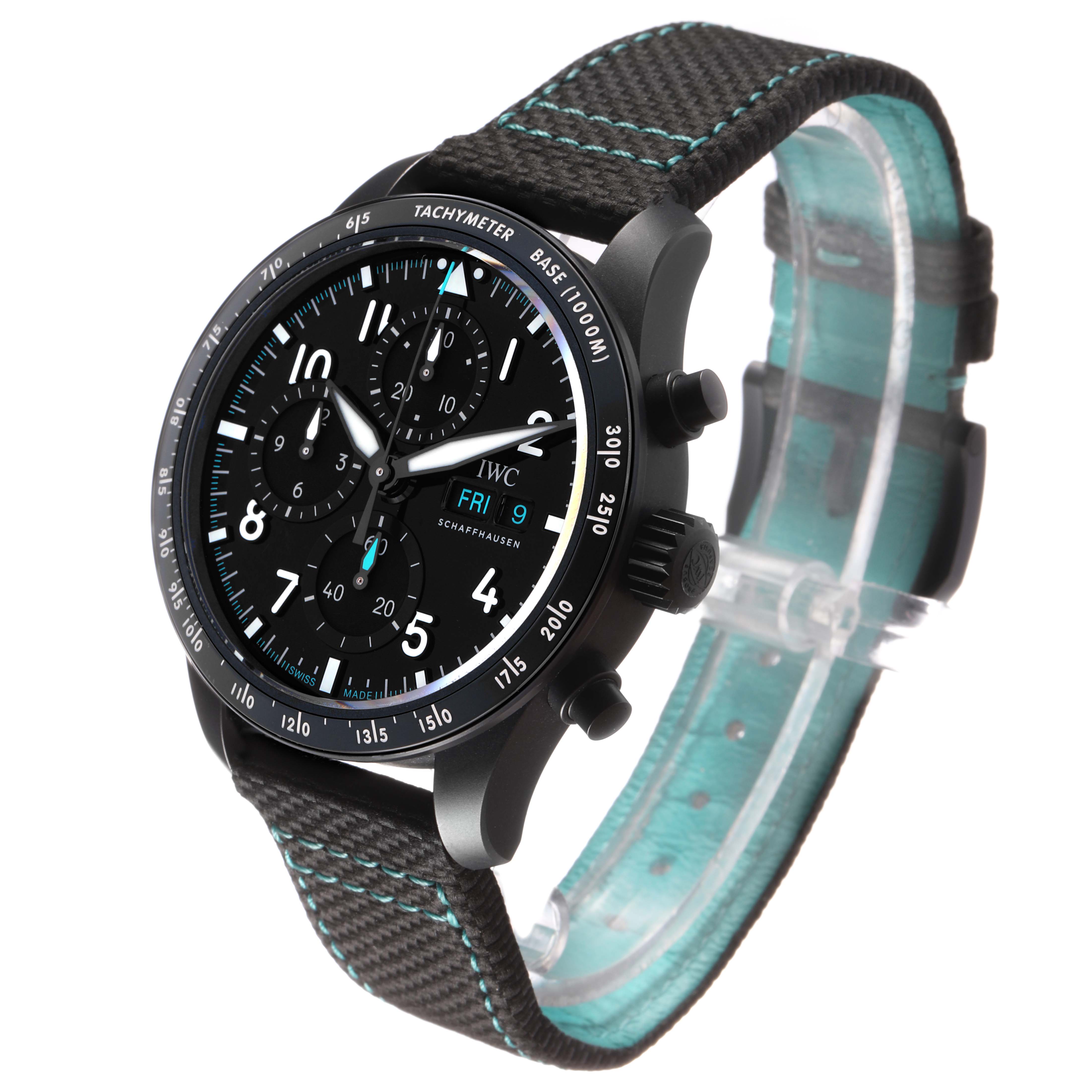 The IWC Pilot IW388306 Men's Ceramic Black Dial watch is shown at a slight angle, featuring the face, bezel, pushers, and textured strap with blue stitching.