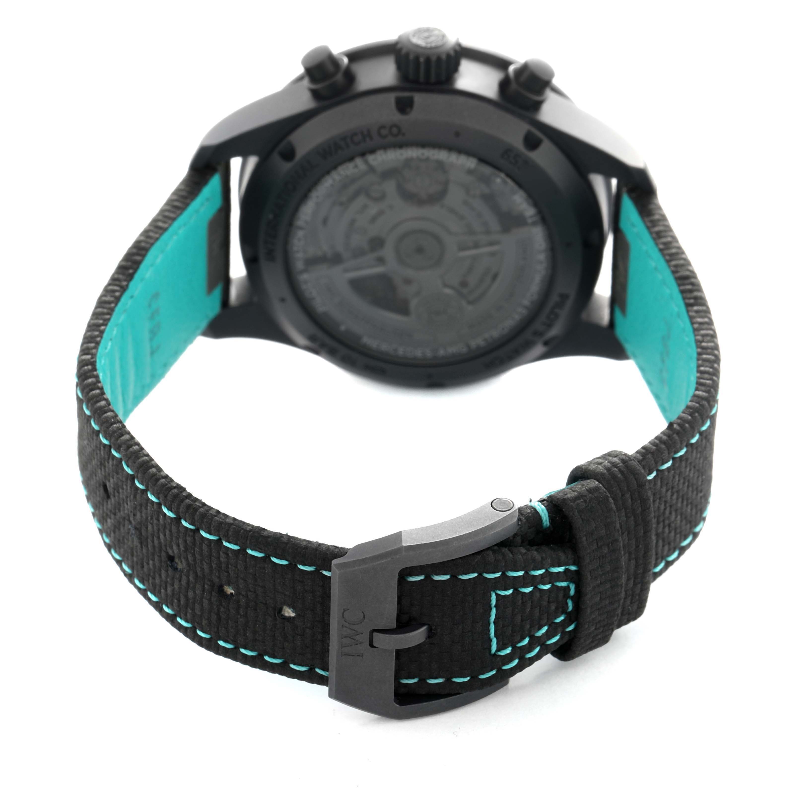 The IWC Pilot IW388306 Men's Ceramic Black Dial watch is shown from the back, highlighting the case back, strap, and buckle.