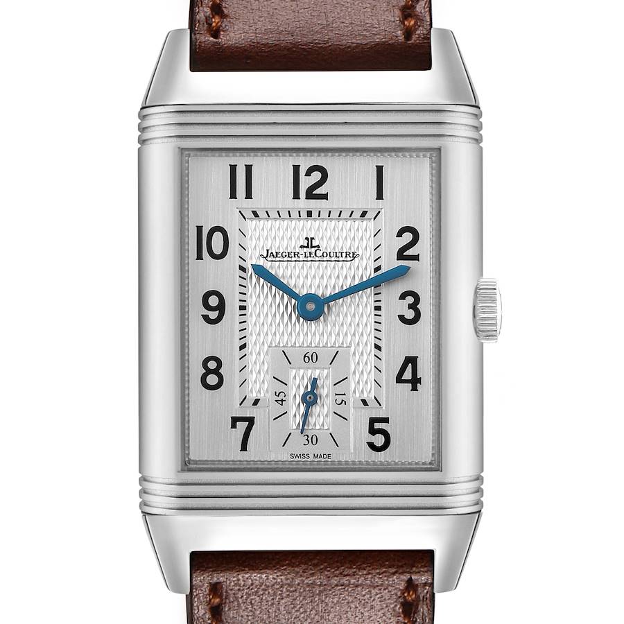 The Jaeger-LeCoultre Reverso watch is shown from a front angle, highlighting the face, crown, and part of the leather strap.