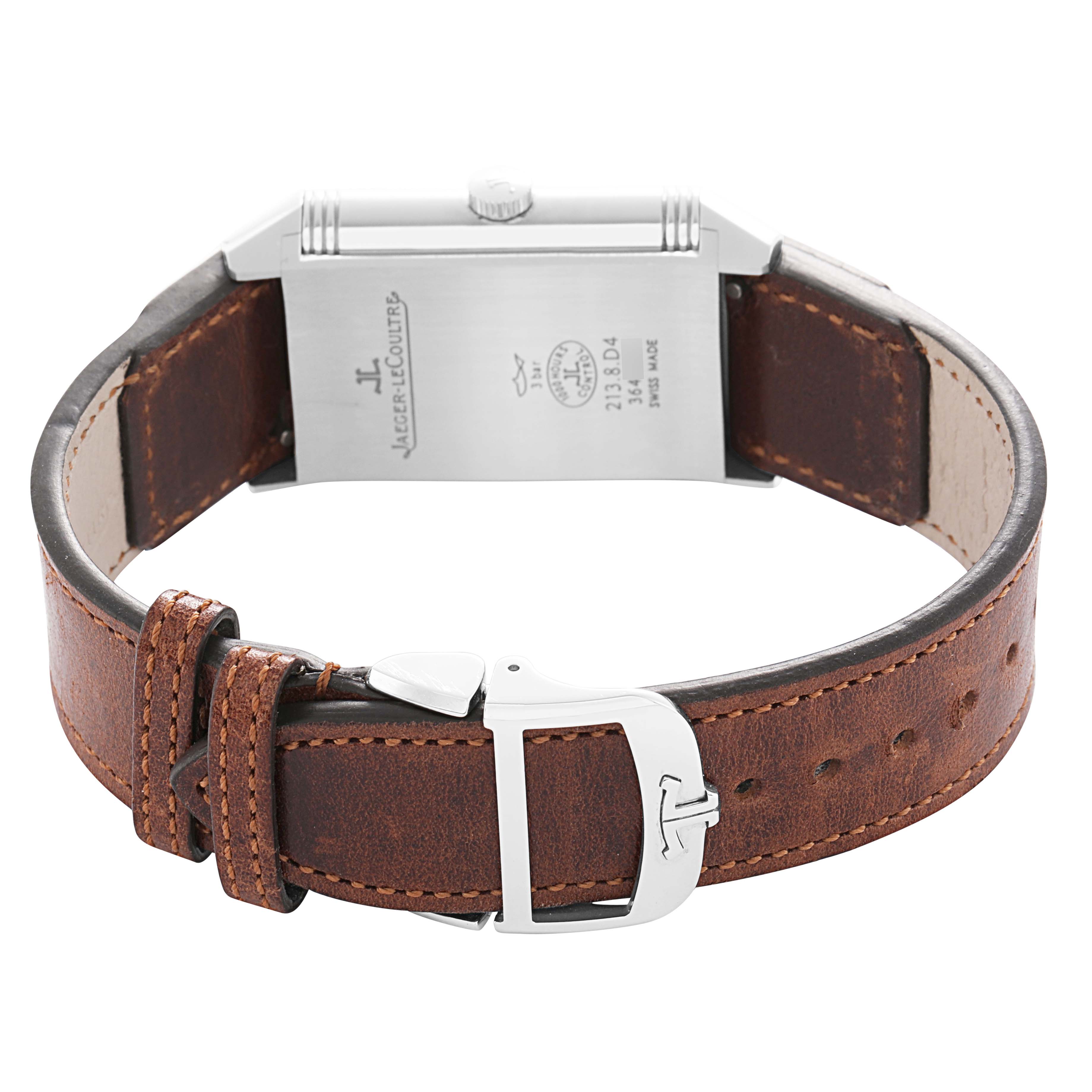 The image shows the back view of a Jaeger-LeCoultre Reverso watch, highlighting its case back, strap, and buckle.