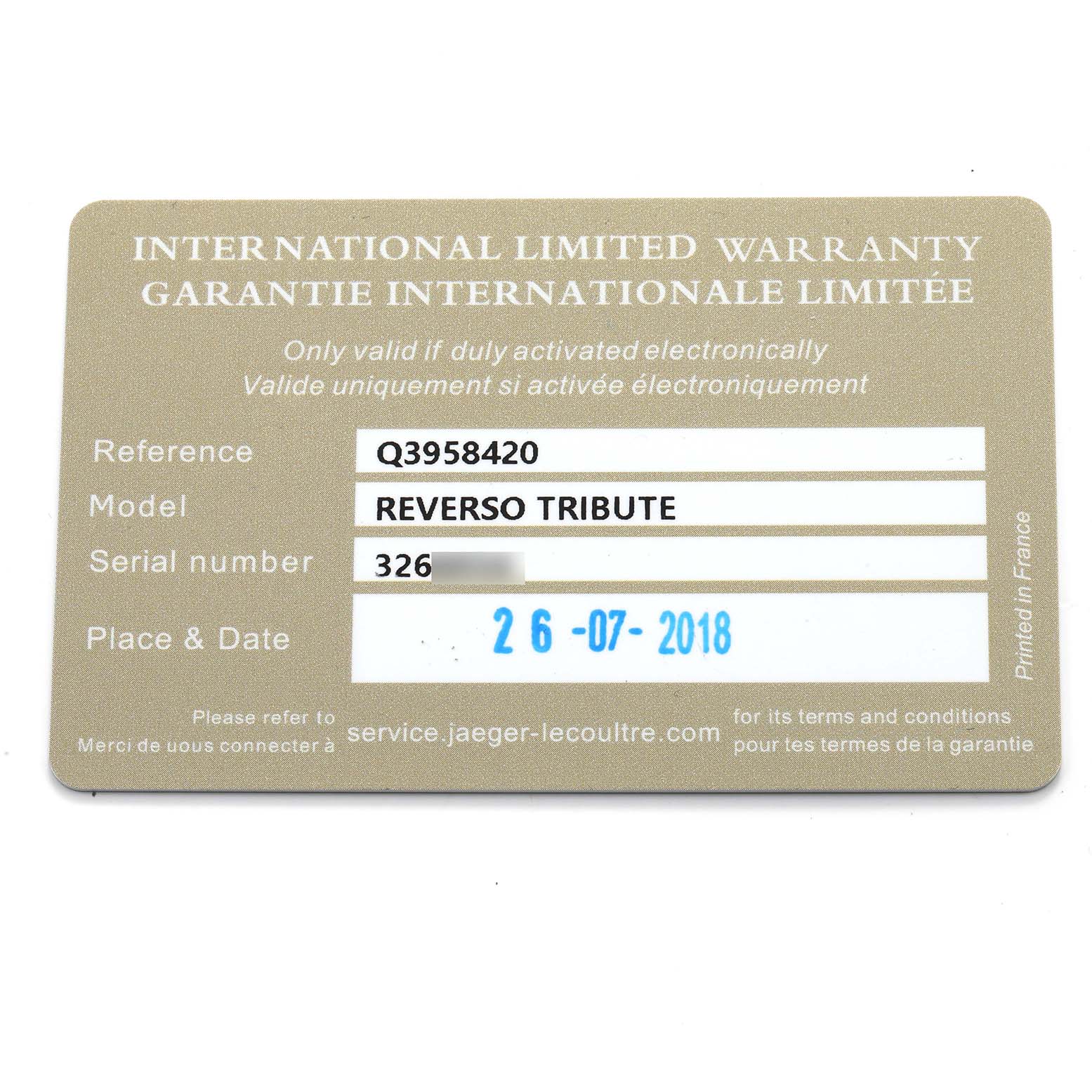 The image shows the warranty card for the Jaeger-LeCoultre Reverso Tribute watch, detailing reference and purchase date.