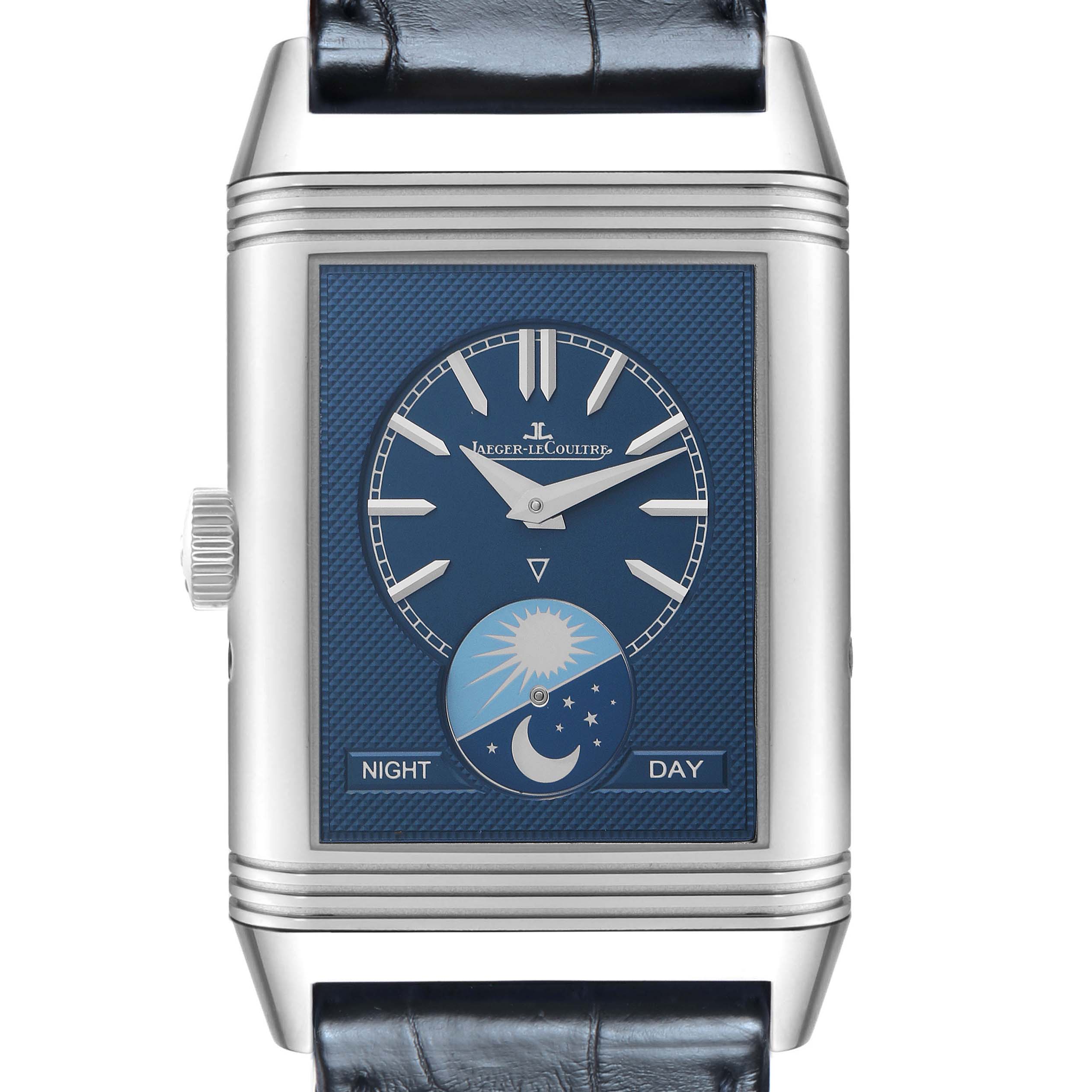 The Jaeger-LeCoultre Reverso watch is shown from the front, highlighting the blue dial with a day-night indicator.