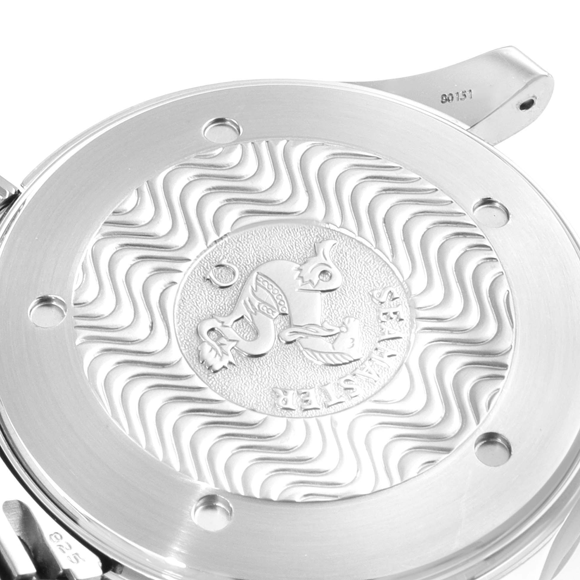 This close-up angle shows the case back of the Omega Seamaster 2531.80.00 Men's Stainless Steel Blue Dial 2531.80.00 Men's Stainless Steel Blue Dial watch, featuring engravings and patterns.