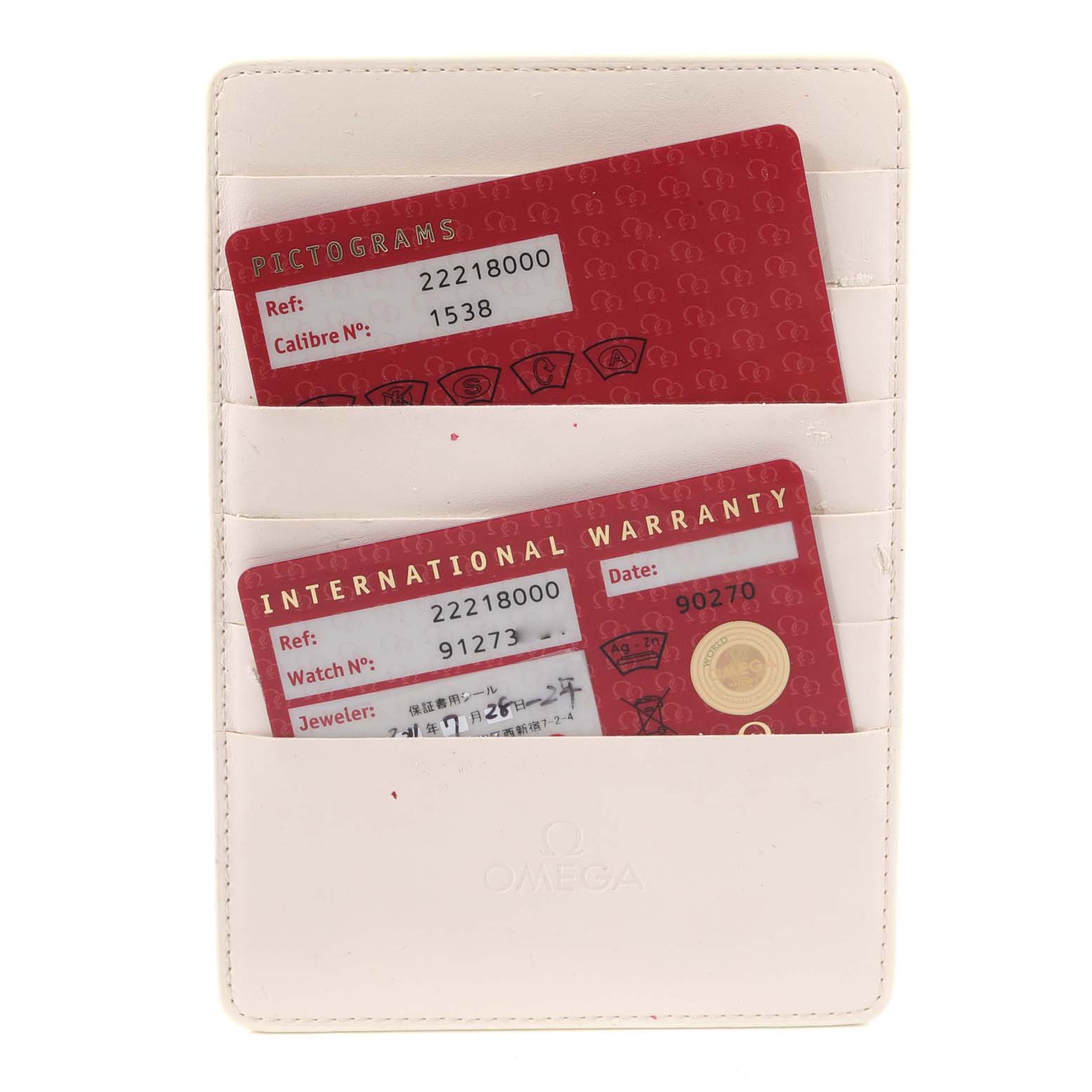 The image shows the warranty cards for the Omega Seamaster 2221.80.00 Men's Stainless Steel Blue Dial 2221.80.00 Men's Stainless Steel Blue Dial model in a white cardholder.