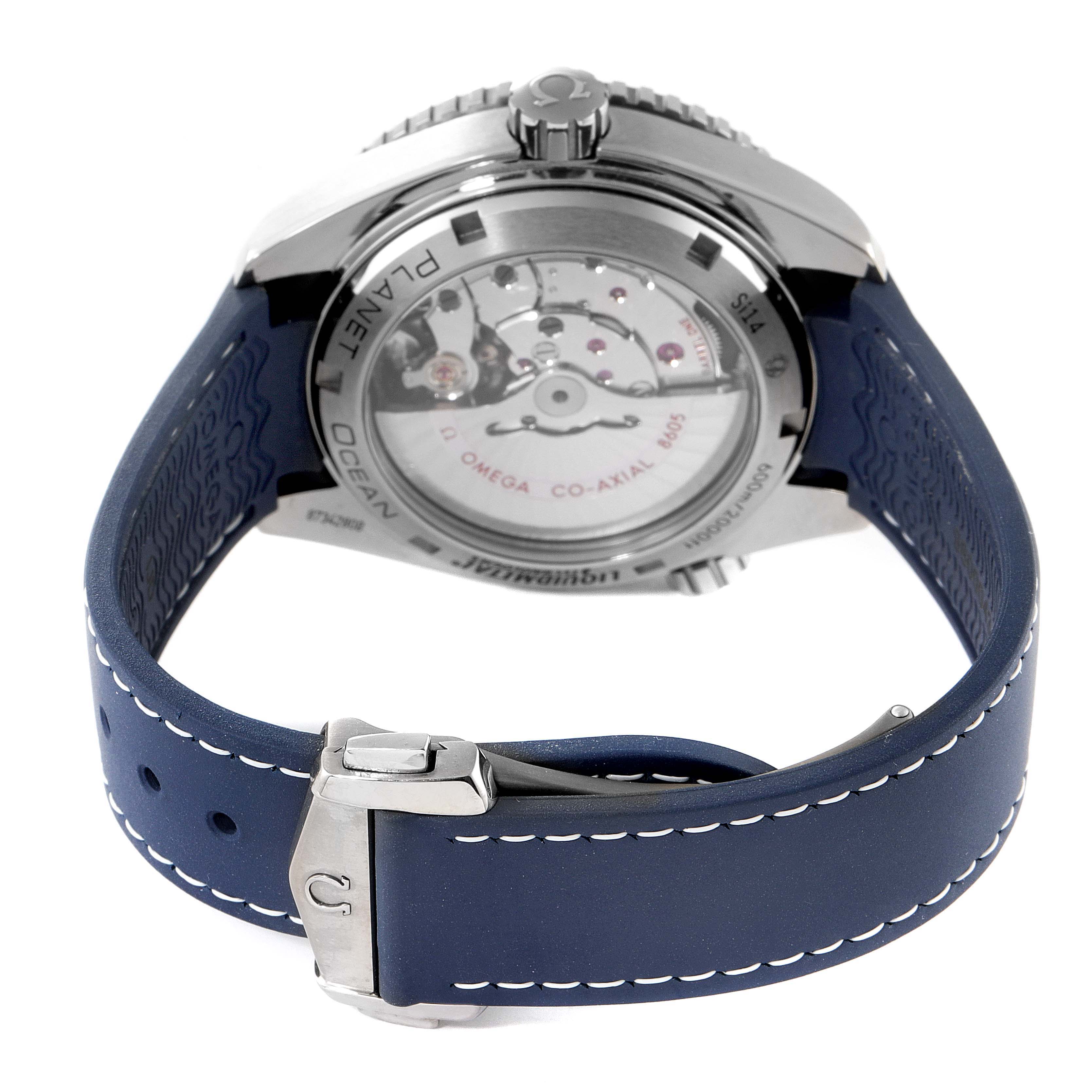 The image shows the back view of the Omega Planet Ocean 232.92.44.22.03.001 Men's Titanium Blue Dial 232.92.44.22.03.001 Men's Titanium Blue Dial watch, highlighting its display caseback and blue strap with stitching.