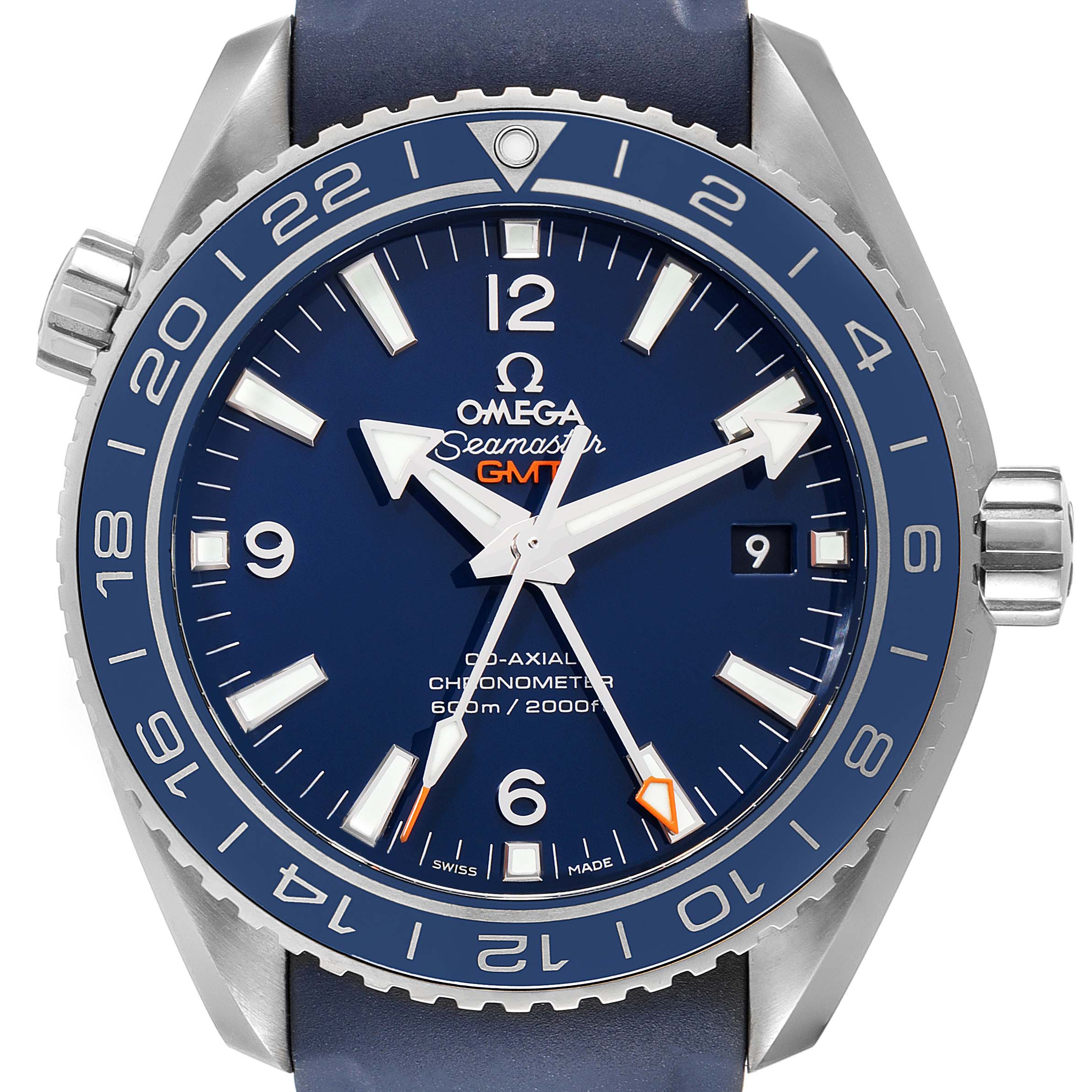 This image shows a close-up of the dial and bezel of the Omega Seamaster Planet Ocean GMT watch.