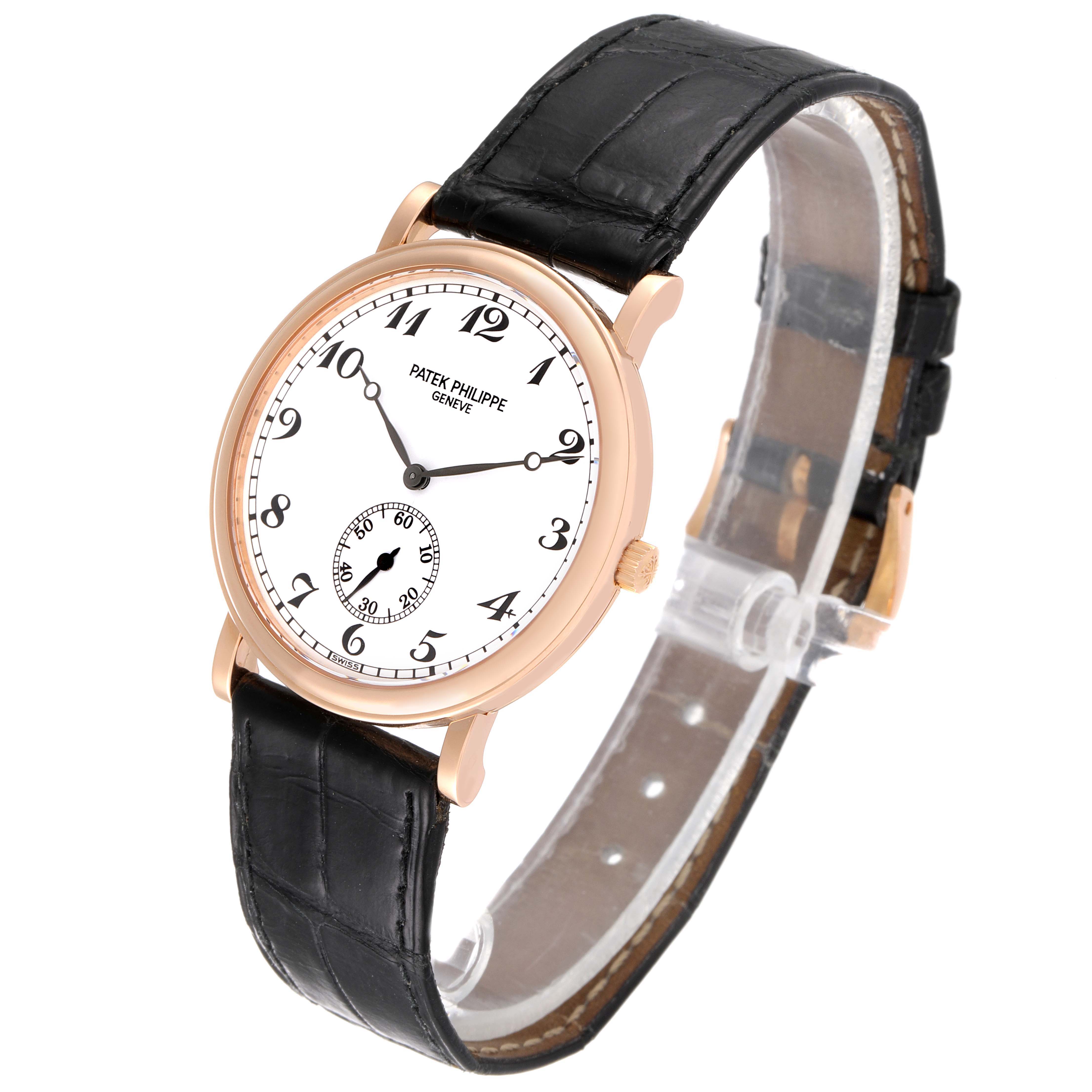 This image shows a Patek Philippe Calatrava 5022R Men's Rose Gold White Dial 5022R Men's Rose Gold White Dial watch at a three-quarter angle, highlighting the face, case, strap, and buckle.